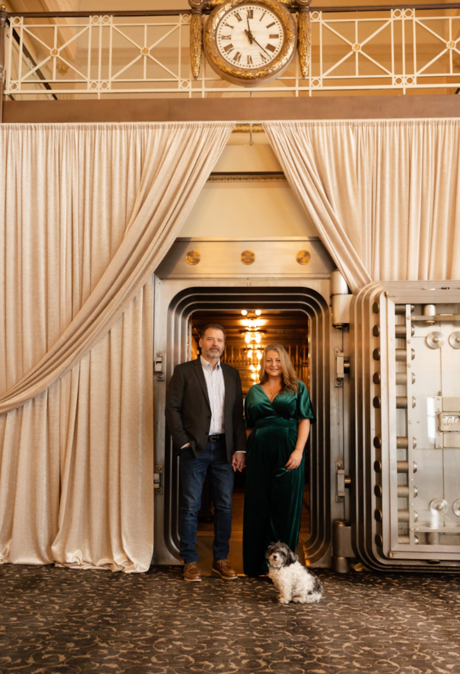 Mica Glaser Jones, right, and her husband Theron, along with their dog Oliver Banks, are seen inside The Windamere in Middletown. Glaser Jones said the dog is the venue mascot. CHRISTINA JANE PHOTOGRAPHY/CONTRIBUTED