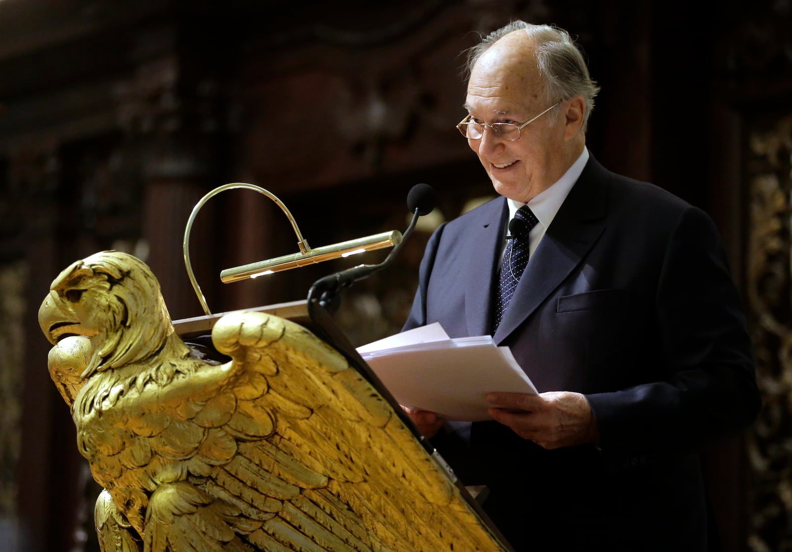 FILE - The Aga Khan, spiritual leader to millions of Muslim, addresses an audience, Thursday, Nov. 12, 2015, at the Memorial Church on the campus of Harvard University in Cambridge, Mass. (AP Photo/Steven Senne, File)