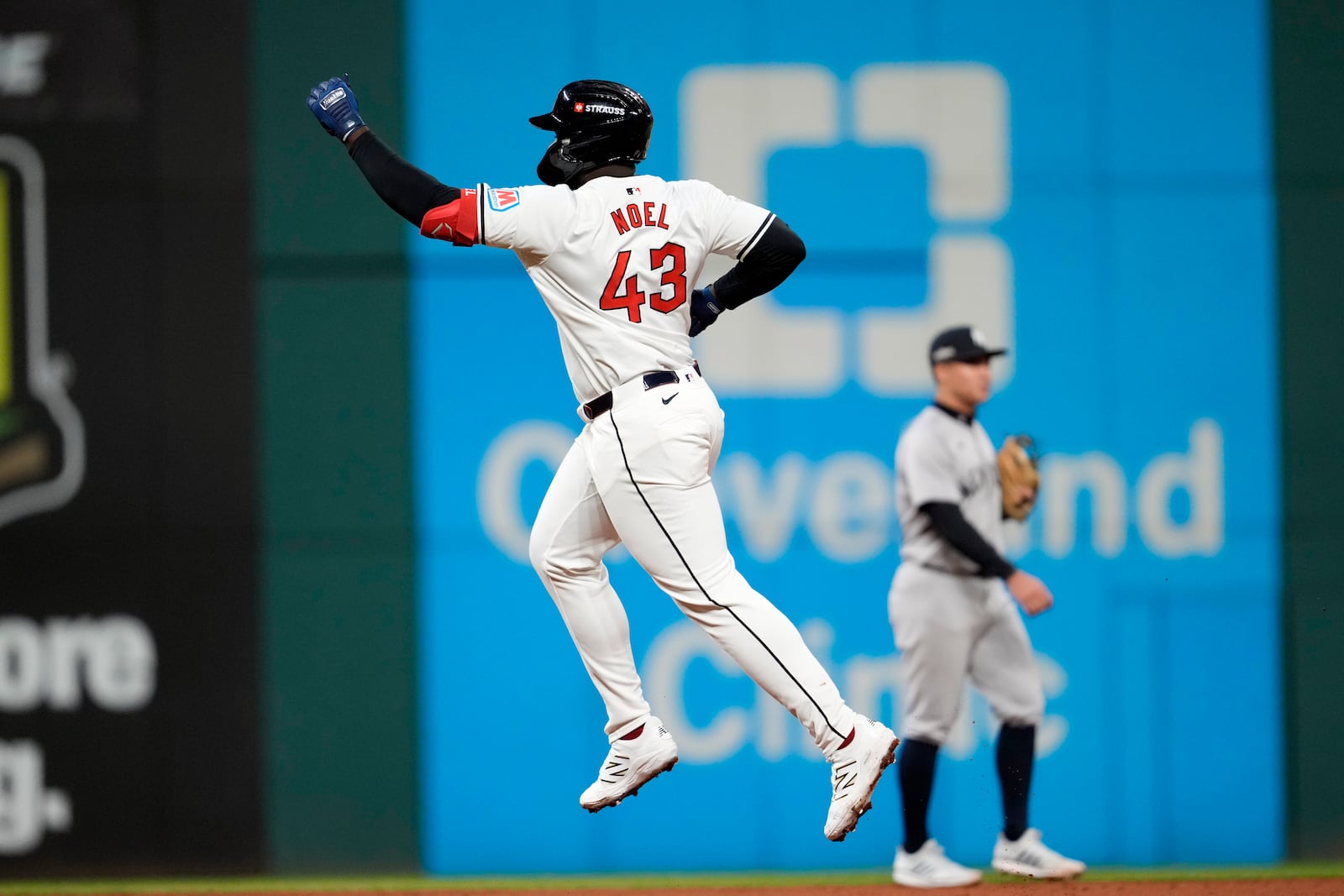 Cleveland Guardians' Jhonkensy Noel (43) celebrates after hitting a two-run home run against the New York Yankees during the ninth inning in Game 3 of the baseball AL Championship Series Thursday, Oct. 17, 2024, in Cleveland. (AP Photo/Godofredo Vásquez )