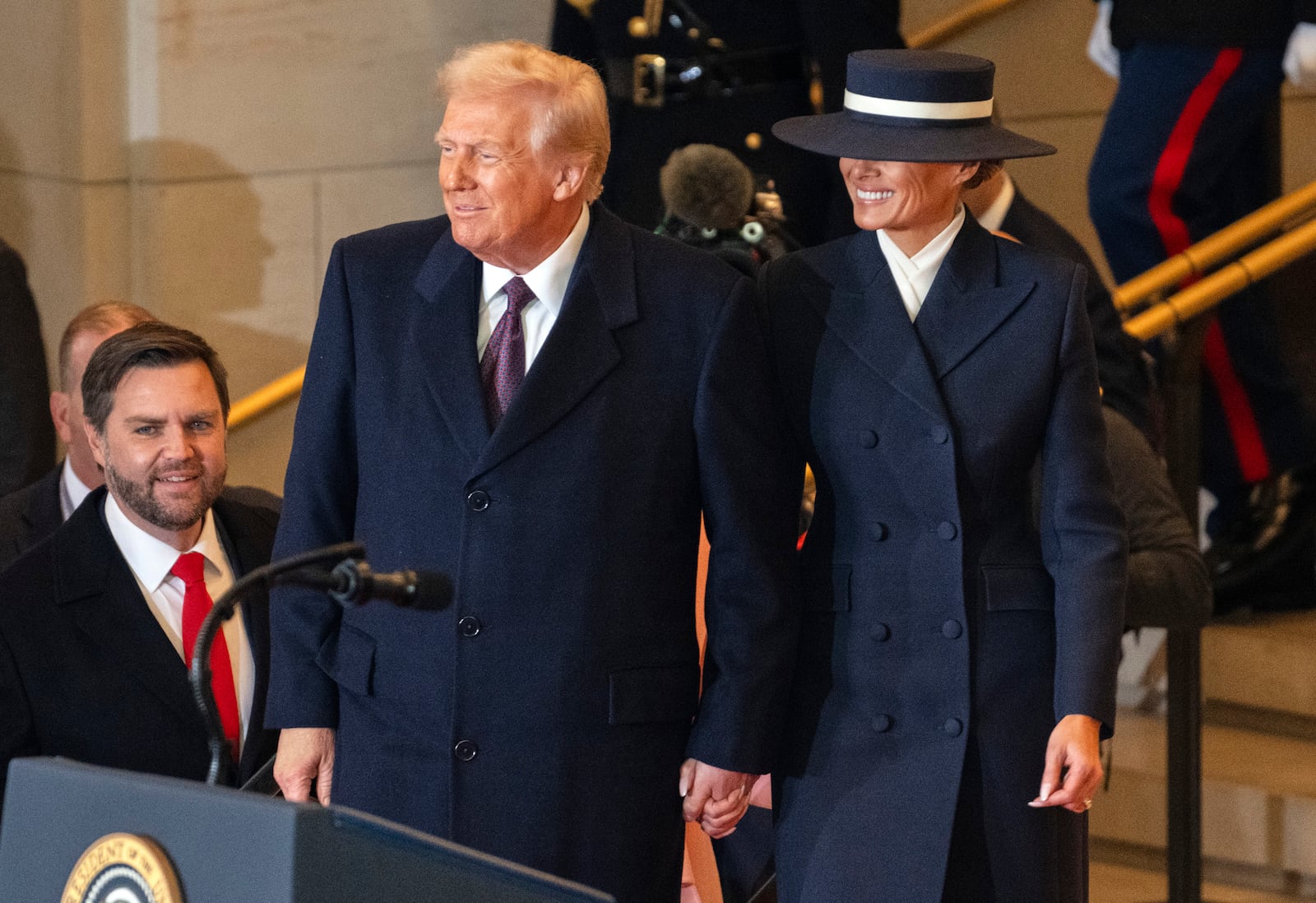 President Donald Trump and first lady Melania Trump arrive in Emancipation Hall after the 60th Presidential Inauguration, Monday, Jan. 20, 2025, at the U.S. Capitol in Washington. (Ron Sachs/Pool Photo via AP)