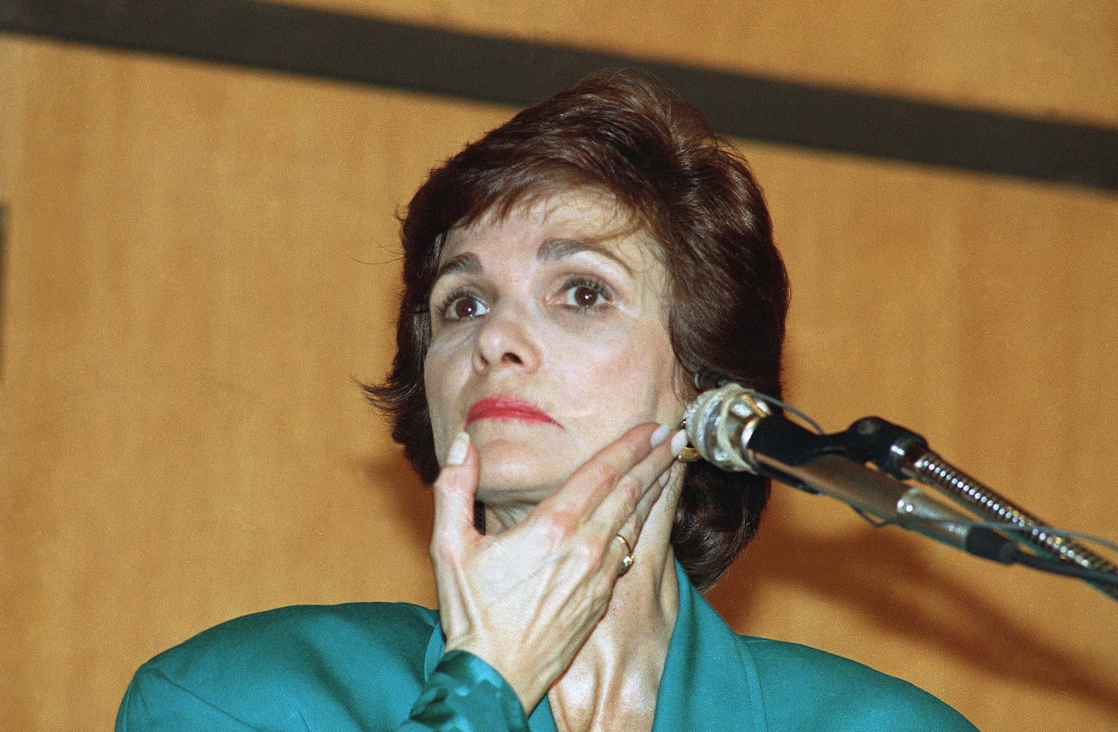 FILE - Kitty Dukakis listens to a question from the audience during a speaking engagement at Villanova University in Villanova, Pa, Wednesday, March 15, 1989. (AP Photo/Sean Kardon, File)