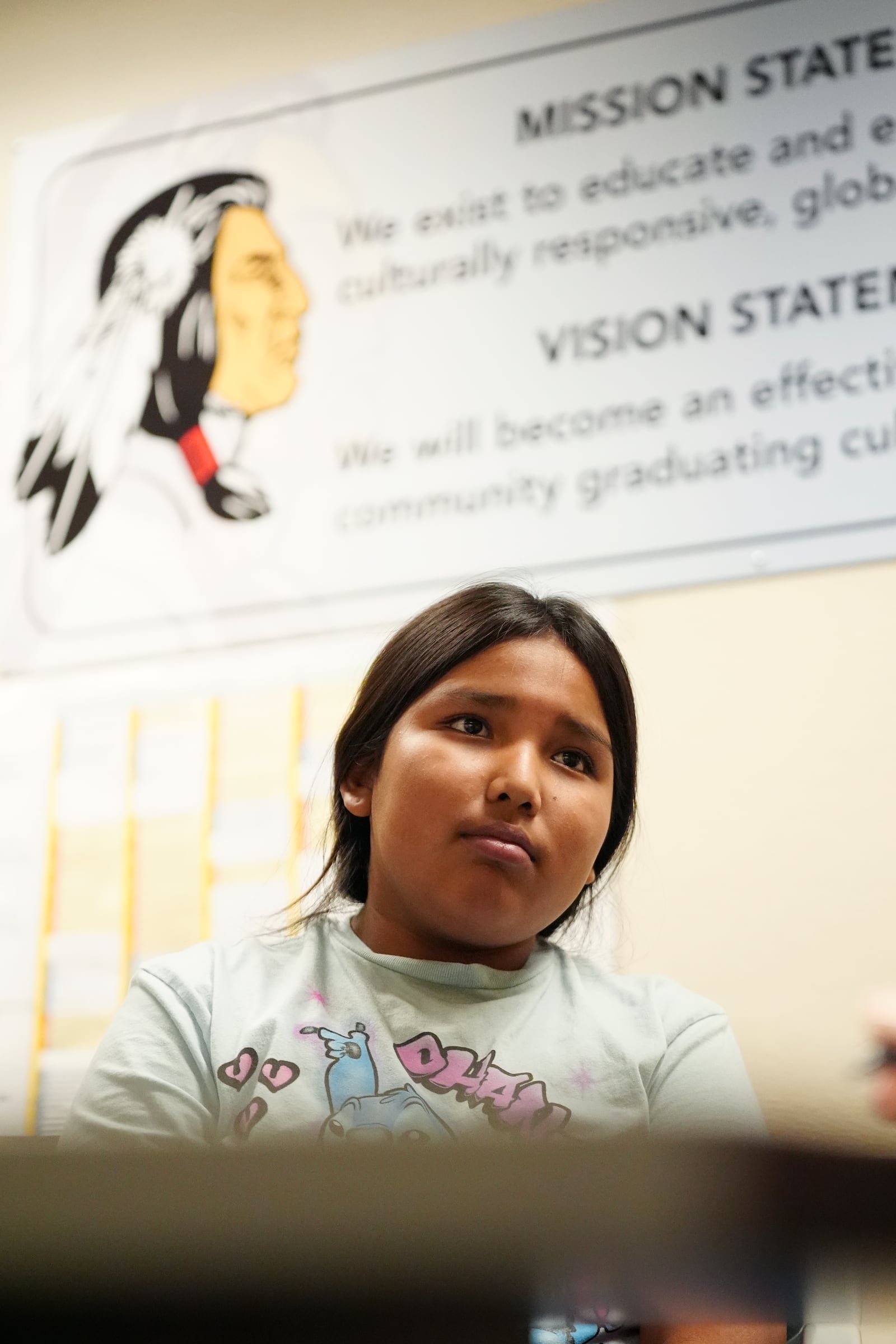 Rice Intermediate School student Gabriella Logan, 10, talks about her school experience Tuesday, Aug. 27, 2024, in San Carlos, Ariz. (AP Photo/Ross D. Franklin)