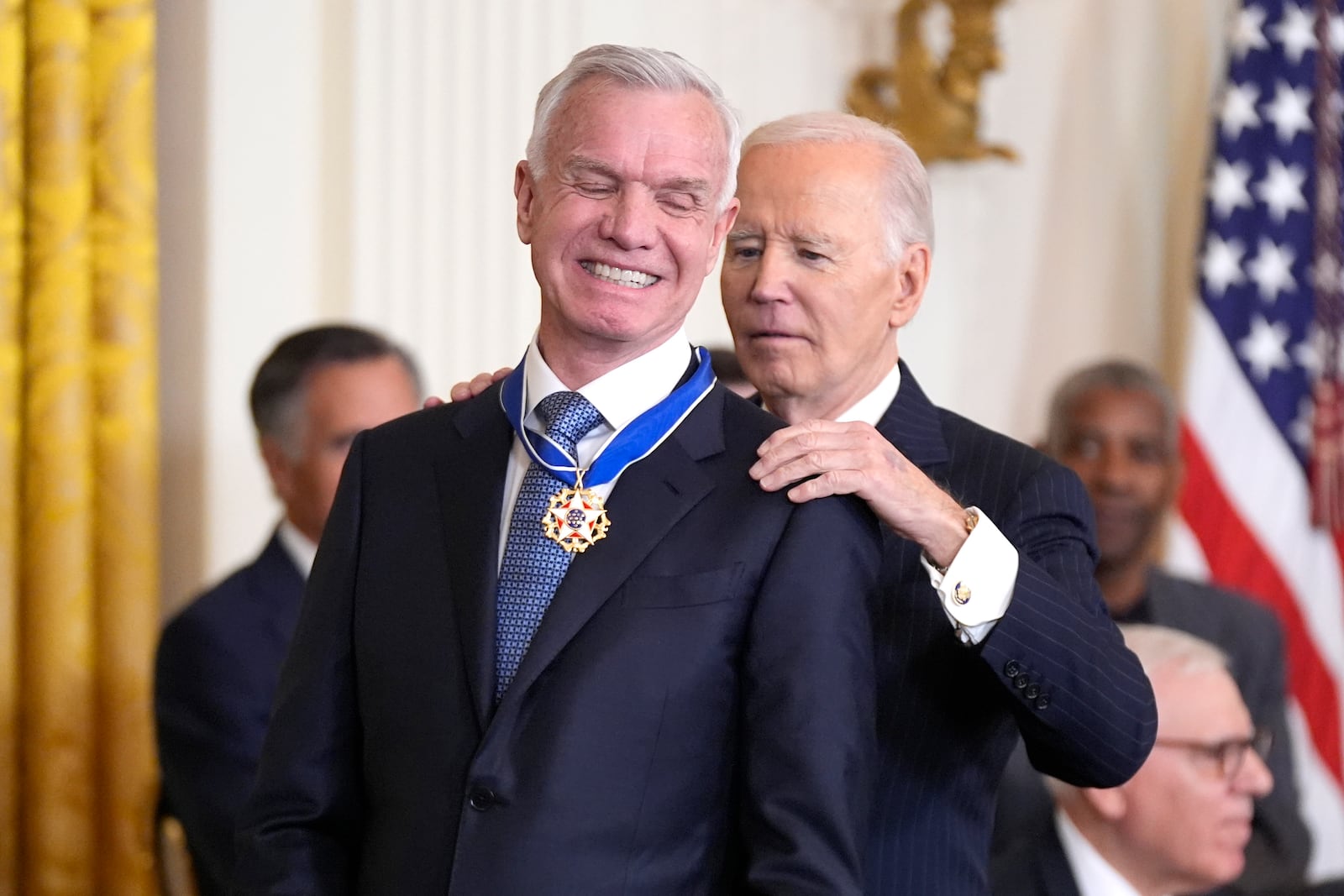 President Joe Biden, right, presents the Presidential Medal of Freedom, the Nation's highest civilian honor, to Tim Gill in the East Room of the White House, Saturday, Jan. 4, 2025, in Washington. (AP Photo/Manuel Balce Ceneta)