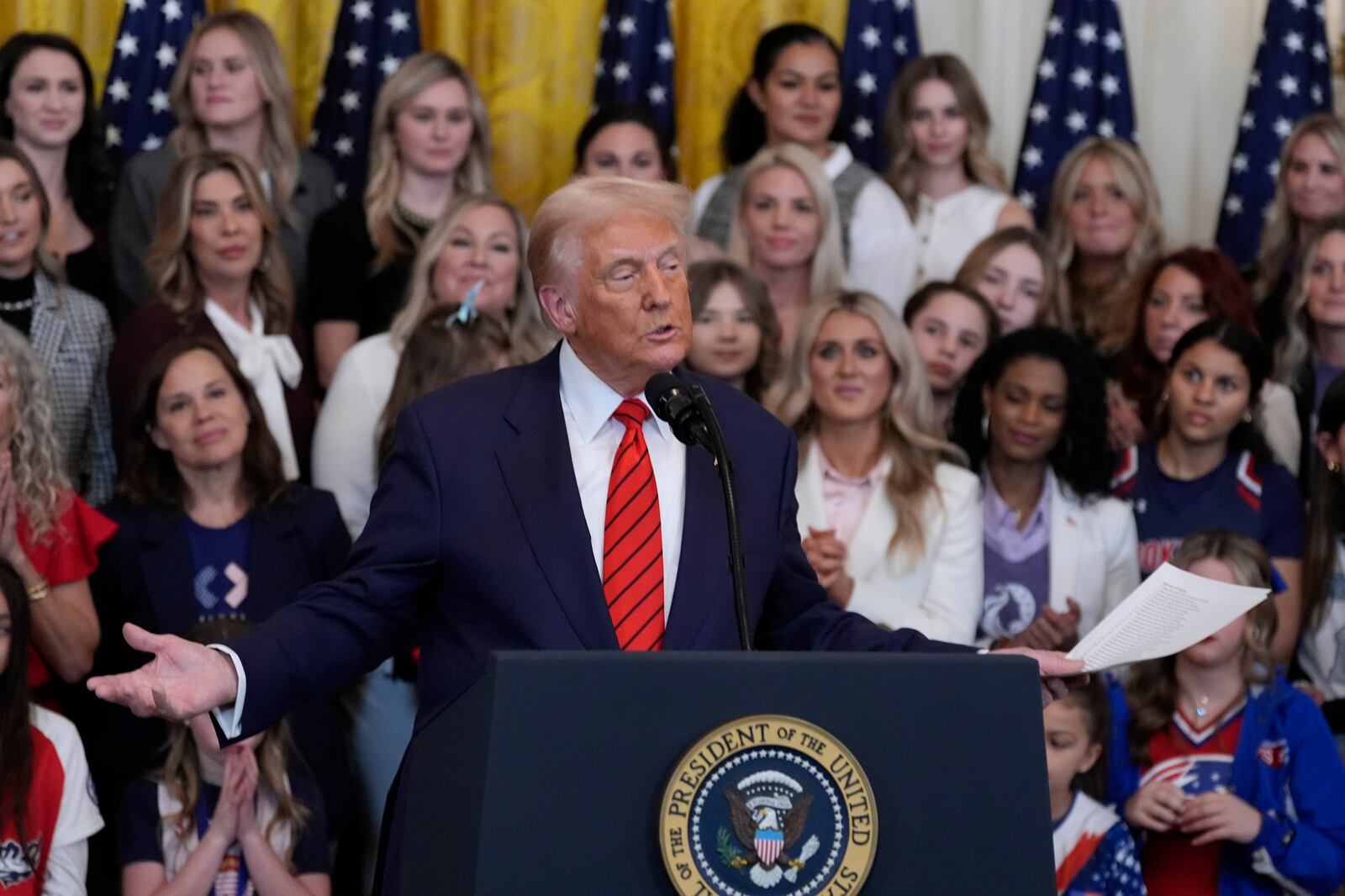 President Donald Trump speaks before signing an executive order barring transgender female athletes from competing in women's or girls' sporting events, in the East Room of the White House, Wednesday, Feb. 5, 2025, in Washington. (AP Photo/Alex Brandon)