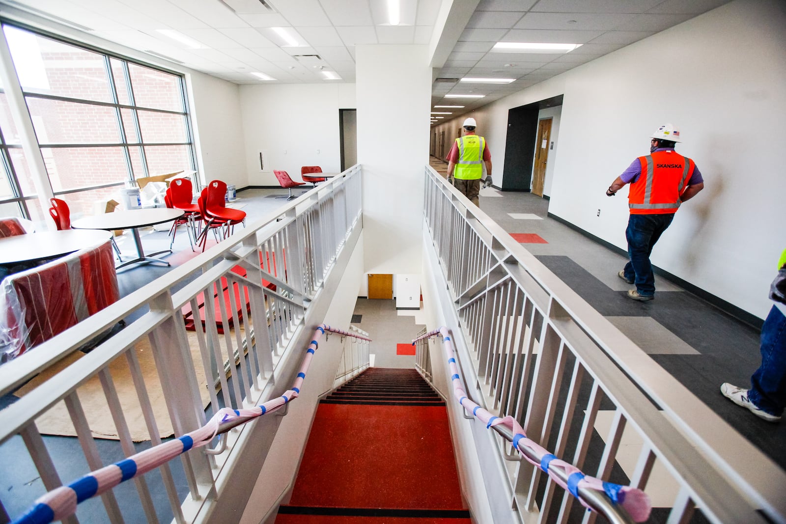 Construction continues on the new $49 million Carlisle school for grades pre-k through 12 Wednesday, July 30, 2020. The school is divided into sections for high school, middle school and elementary school and will consolidate four schools into one building.  NICK GRAHAM / STAFF