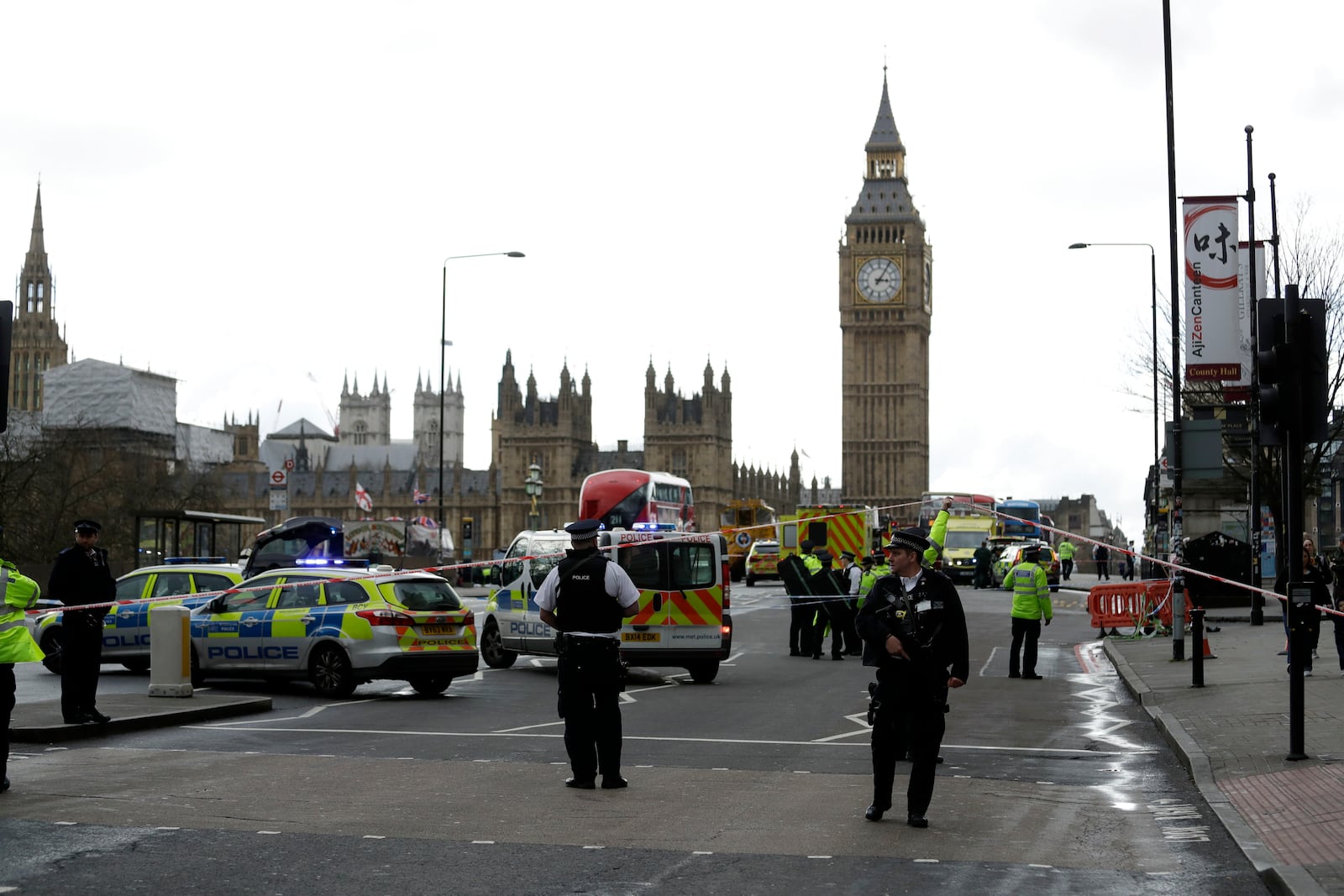 FILE - In this Wednesday, March 22, 2017 file photo, police secure the area on the south side of Westminster Bridge close to the Houses of Parliament in London. (AP Photo/Matt Dunham, File)