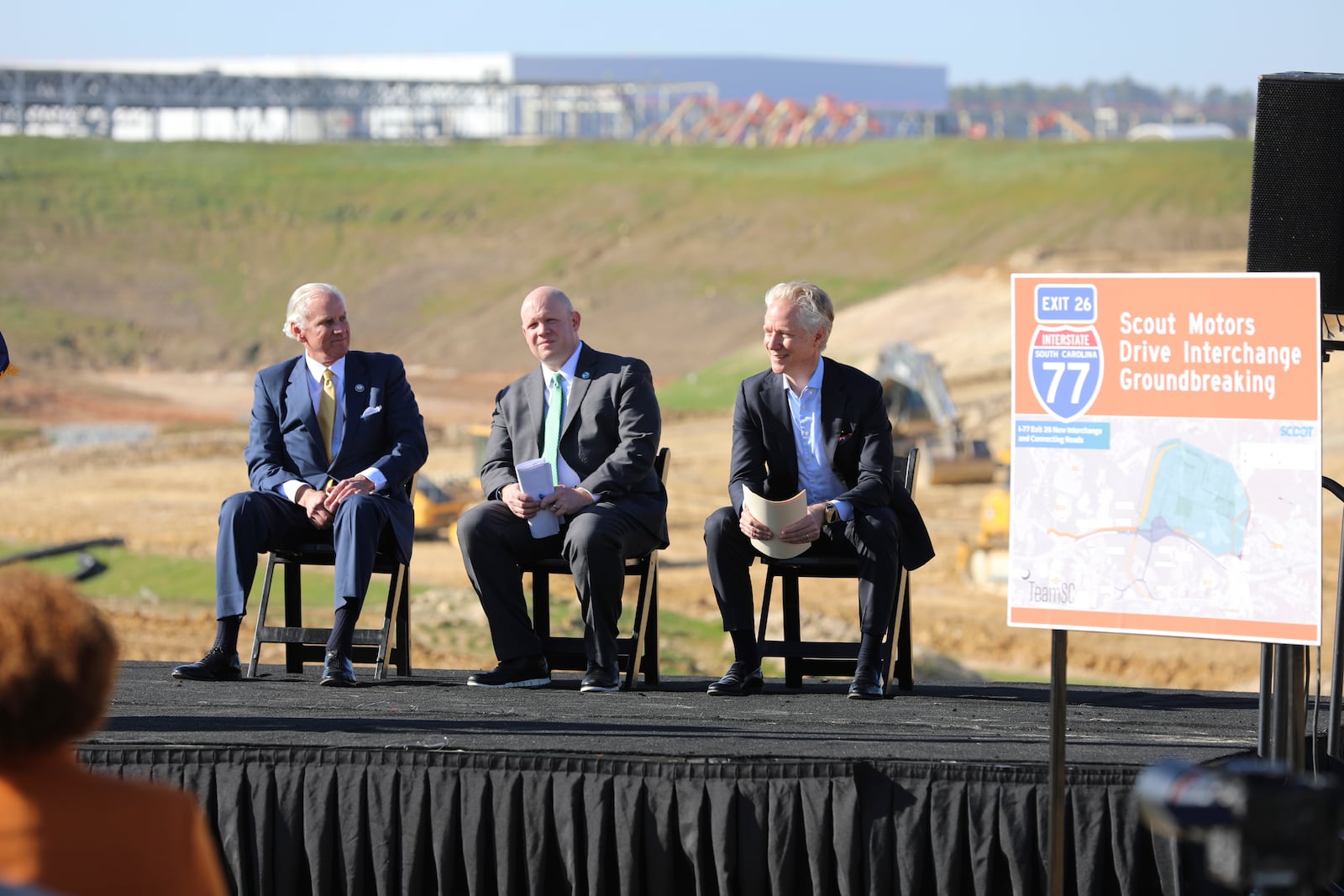 South Carolina Republican Gov. Henry McMaster, left, state Department of Transportation Secretary Justin Powell, center, and Scout Motors CEO Scott Keogh, right, attend a groundbreaking for a new interstate exit for the Scout Motors plant on Monday, Feb. 3, 2025, in Blythewood, S.C . (AP Photo/Jeffrey Collins)