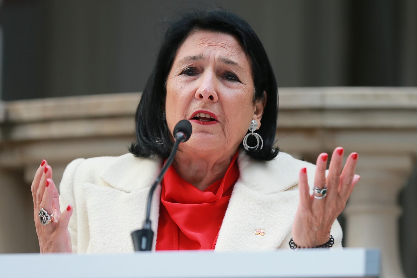 Outgoing Georgian President Salome Zourabichvili holds a press conference outside the Orbeliani Palace, the official residence of the President of Georgia, in Tbilisi, Georgia, Sunday, Dec. 29, 2024. (AP Photo/Zurab Tsertsvadze)