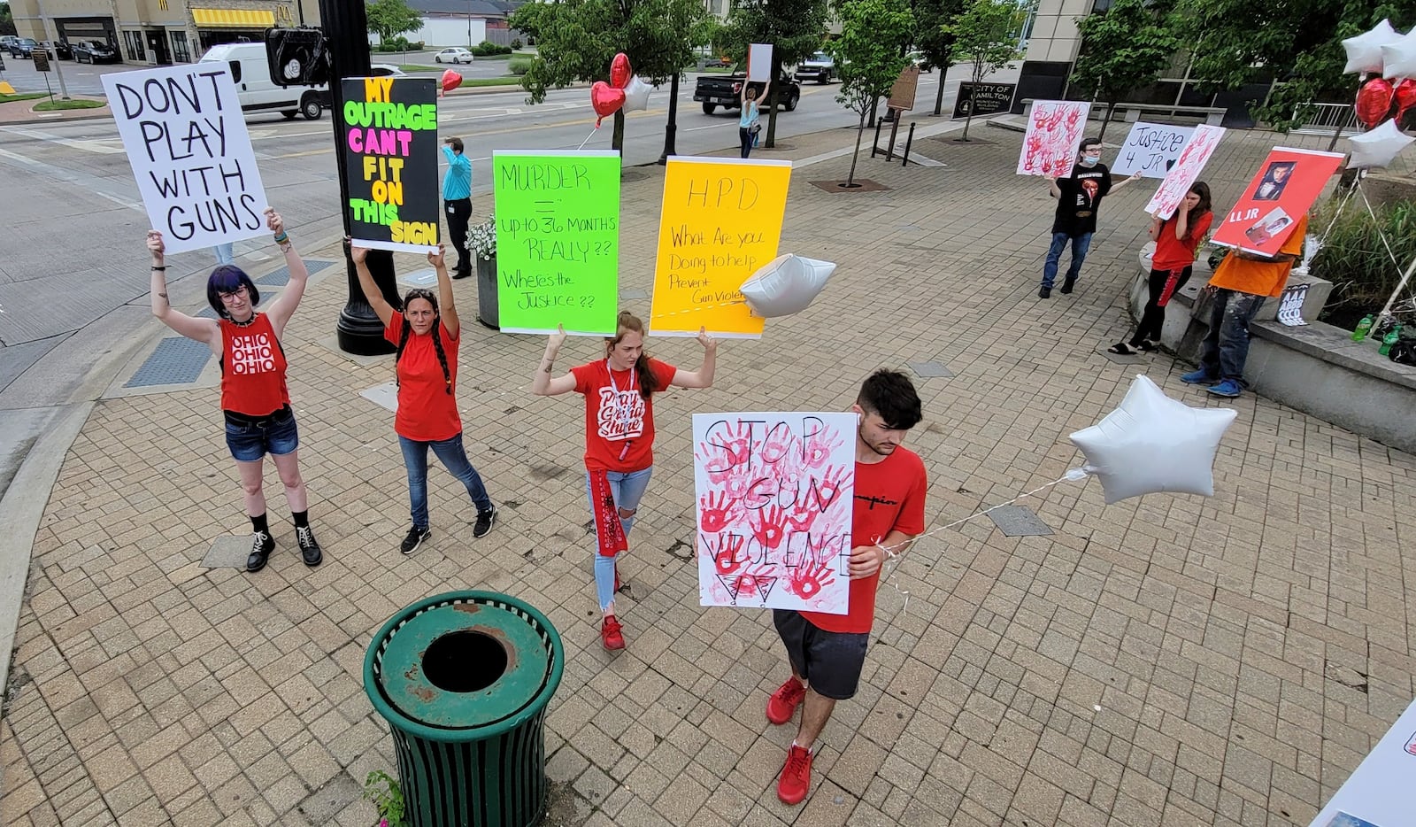 Family and friends of J.R. Boggs, who was shot and killed by Aeriel Brazzell, rally outside Butler County Common Pleas Court Thursday, June 10, 2021 in Hamilton. Brazzell pleaded guilty to reckless homicide. NICK GRAHAM / STAFF