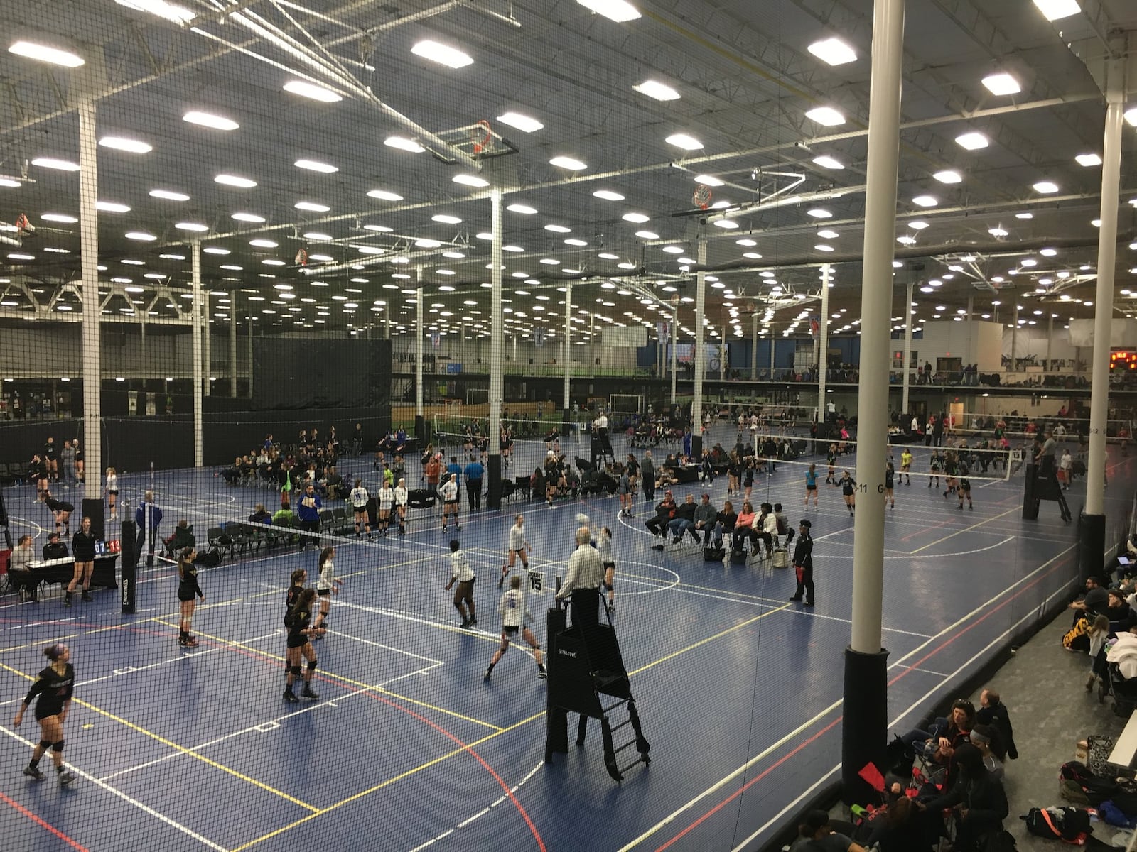 When the Spooky Nook Sports at Champion Mill opens in Hamilton, it will offer a variety of sports that people around here usually can’t play during the winter, including softball and flag football. Here, the sprawling Spooky Nook complex near Manheim, Pa., hosts a volleyball tournament. MIKE RUTLEDGE/STAFF