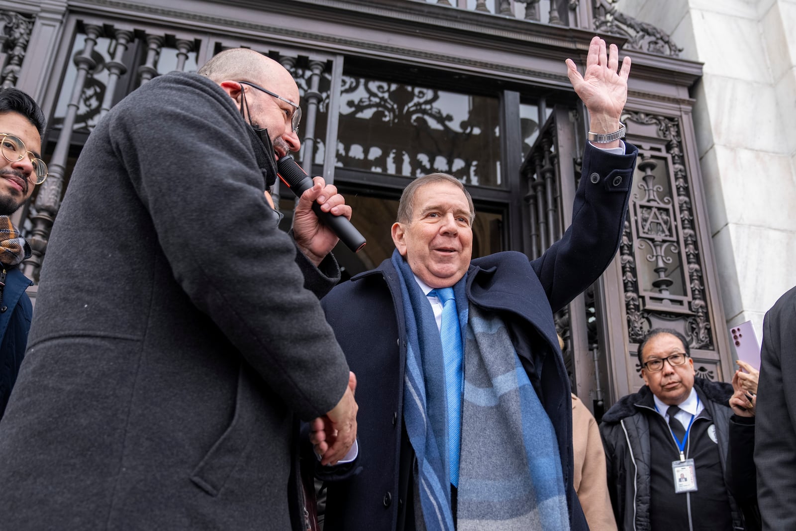 Edmundo Gonzalez, who represented Venezuela's main opposition coalition in the July presidential election, waves as he arrives to address a gathering of supporters outside of the Organization of American States, Monday, Jan. 6, 2025, in Washington. (AP Photo/Jacquelyn Martin)