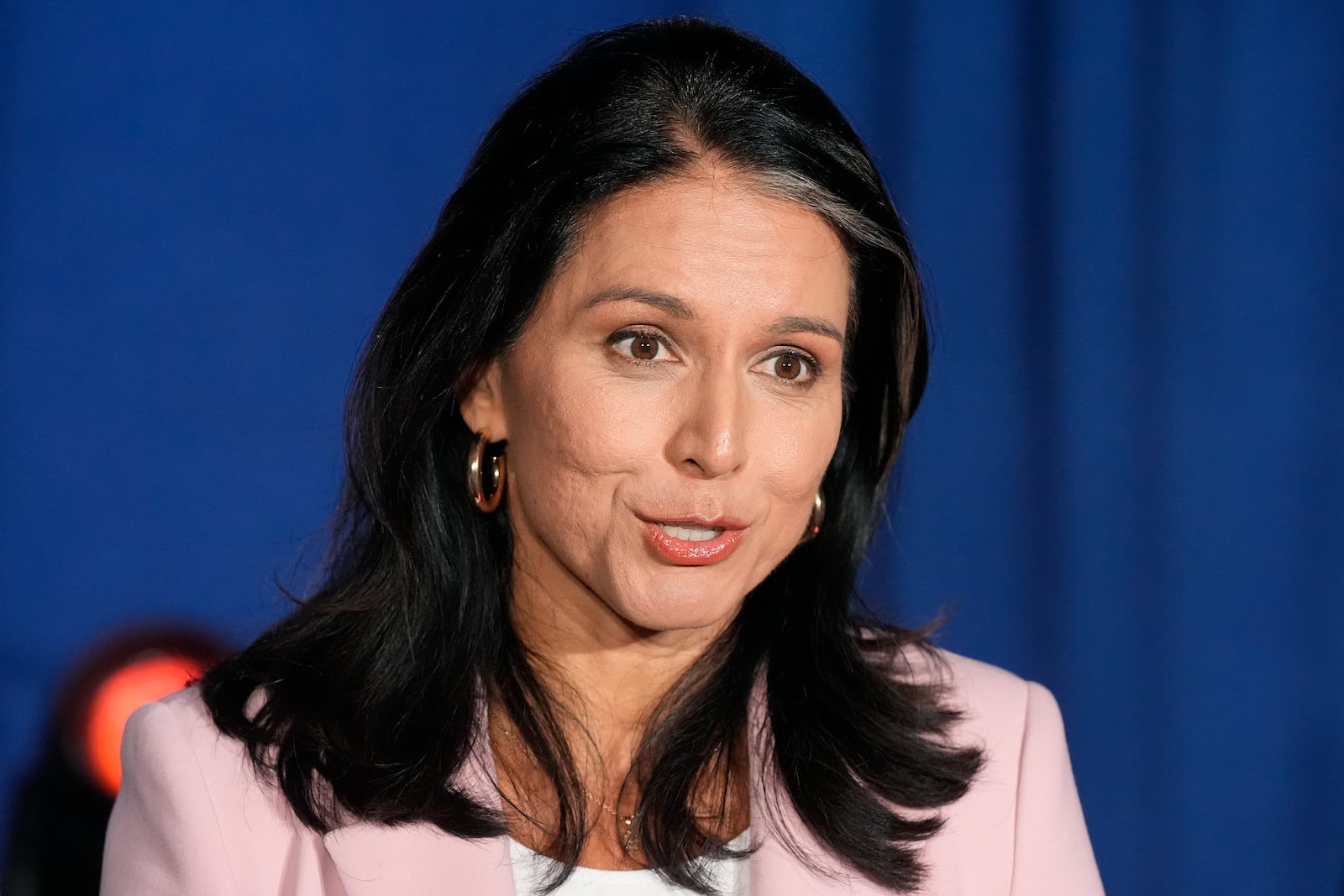 FILE - Former Democratic Rep. Tulsi Gabbard answers a question during a campaign event, Sept. 14, 2024, in Glendale, Ariz. (AP Photo/Ross D. Franklin, File)