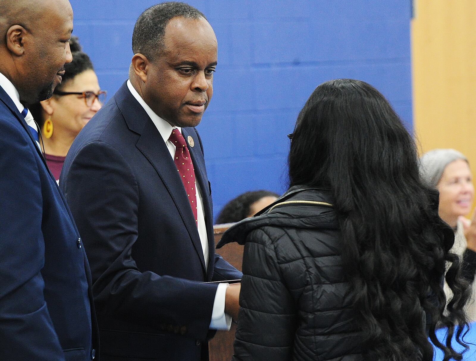 Central State President Jack Thomas awarding Dunbar High School seniors surprise scholarships to Central State University, Friday April 1, 2022. MARSHALL GORBY\STAFF