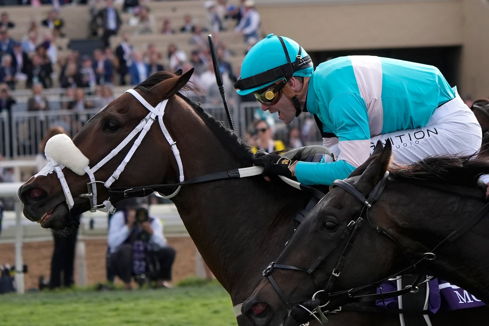 Flavien Prat rides Moira to victory in the Breeders' Cup Filly and Mare Turf horse race in Del Mar, Calif., Saturday, Nov. 2, 2024. (AP Photo/Gregory Bull)