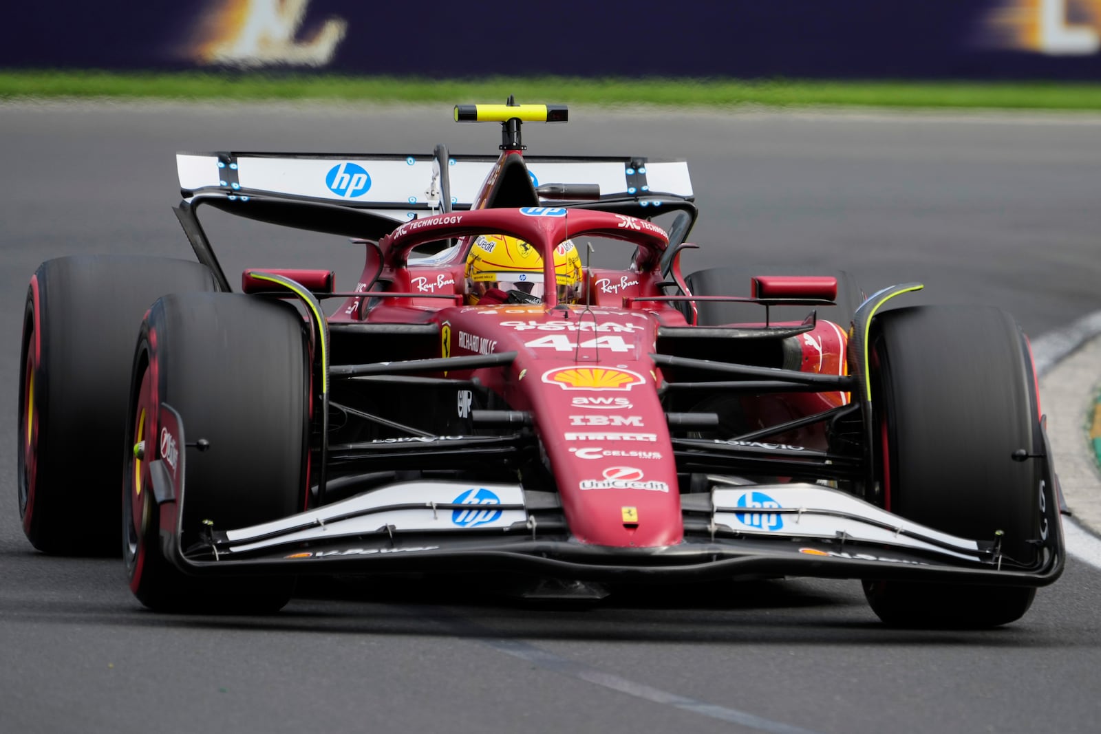 Ferrari driver Lewis Hamilton of Britain steers his car during qualifying at the Australian Formula One Grand Prix at Albert Park, in Melbourne, Australia, Saturday, March 15, 2025. (AP Photo/Asanka Brendon Ratnayake)