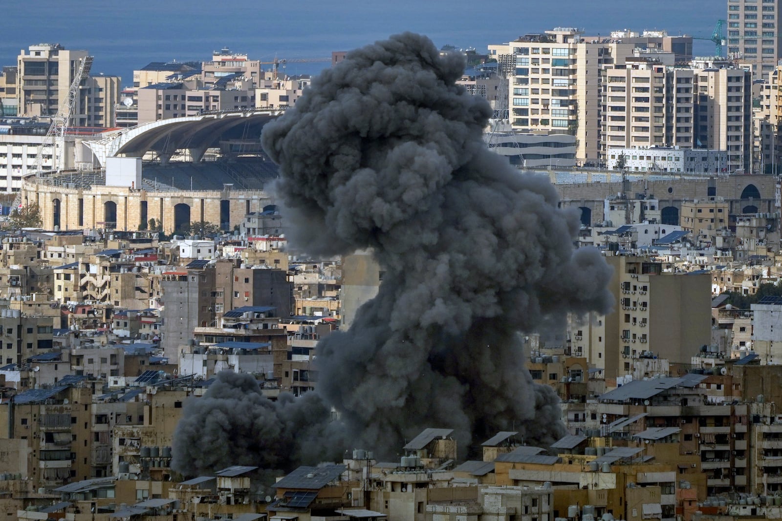 Smoke rises after an Israeli airstrike on Dahiyeh, in the southern suburb of Beirut, Lebanon, Wednesday, Nov. 13, 2024. (AP Photo/Hassan Ammar)