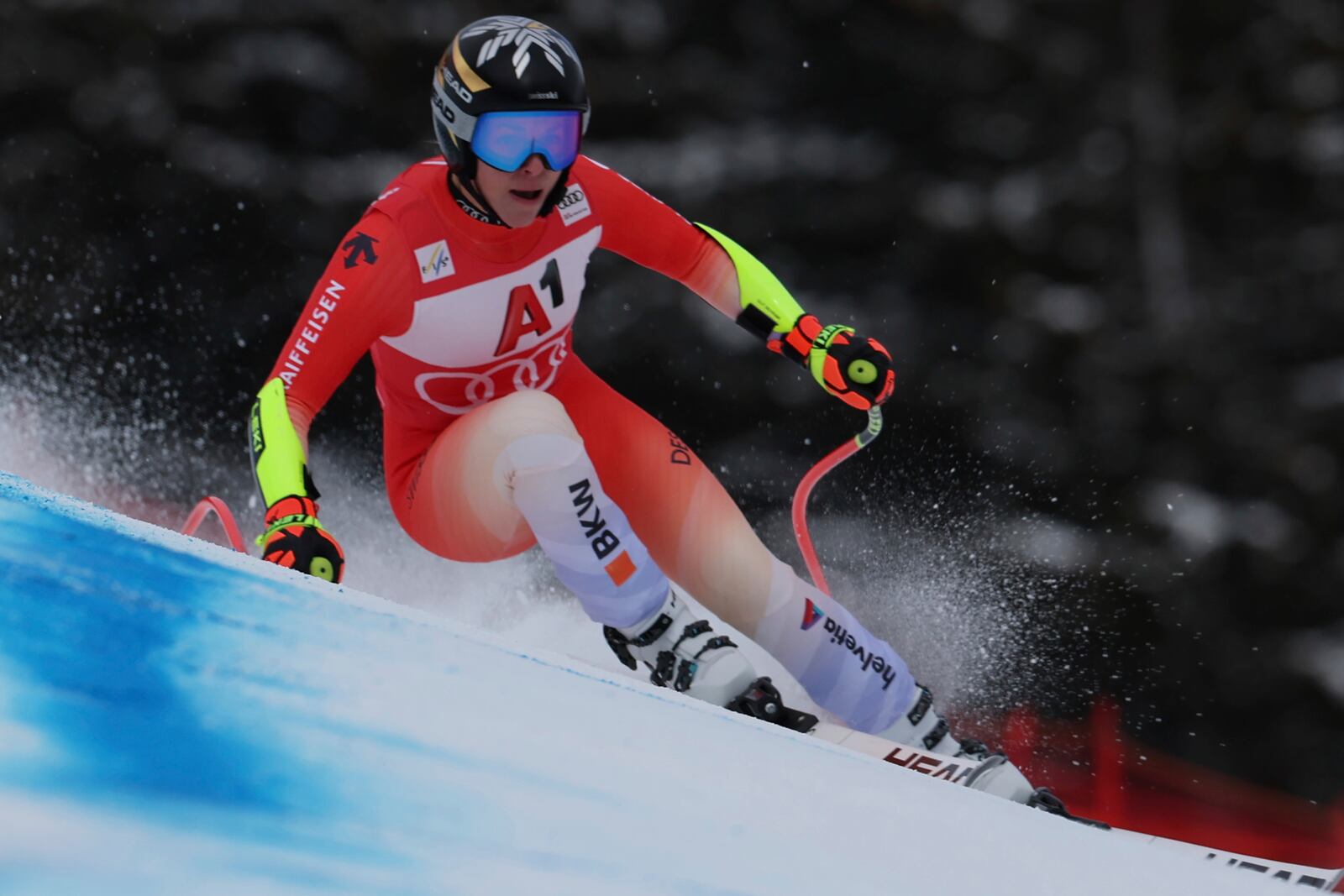 Switzerland's Lara Gut Behrami speeds down the course during an alpine ski, women's World Cup super G race, in St. Anton, Austria, Sunday, Jan. 12, 2025. (AP Photo/Marco Trovati)