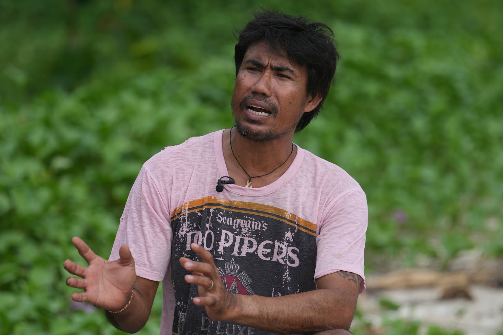 Suriyan Klathale speaks during an interview with The Associated Press at Surin Islands, Phang Nga Province, Thailand, Monday, Dec. 9, 2024. (AP Photo/Sakchai Lalit)