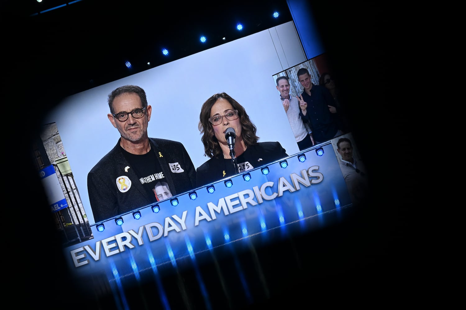 
                        A screen displays Ronen and Orna Neutra, the parents of an American-Israeli hostage in Gaza, as they speak on the third night of the Republican National Convention at the Fiserv Forum in Milwaukee, on Wednesday, July 17, 2024. (Kenny Holston/The New York Times)
                      