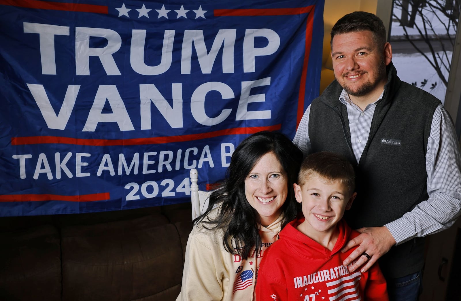 Kelley Carter, left, Miles Carter, 9, and Corey Carter, from Middletown, are heading to Washington, D.C. to attend the inauguration of Donald Trump and JD Vance. NICK GRAHAM/STAFF