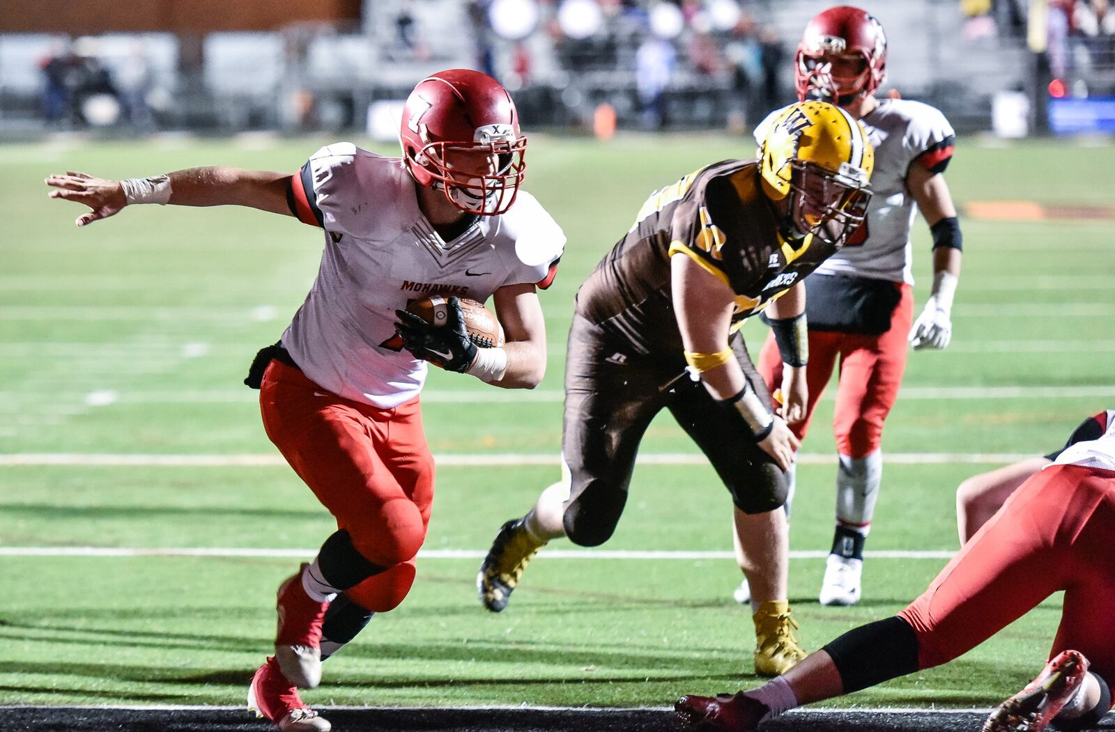 Madison quarterback Mason Whiteman runs for a touchdown during last Friday’s 42-7 victory over West Jefferson in the Division V, Region 20 championship game at Beavercreek. NICK GRAHAM/STAFF