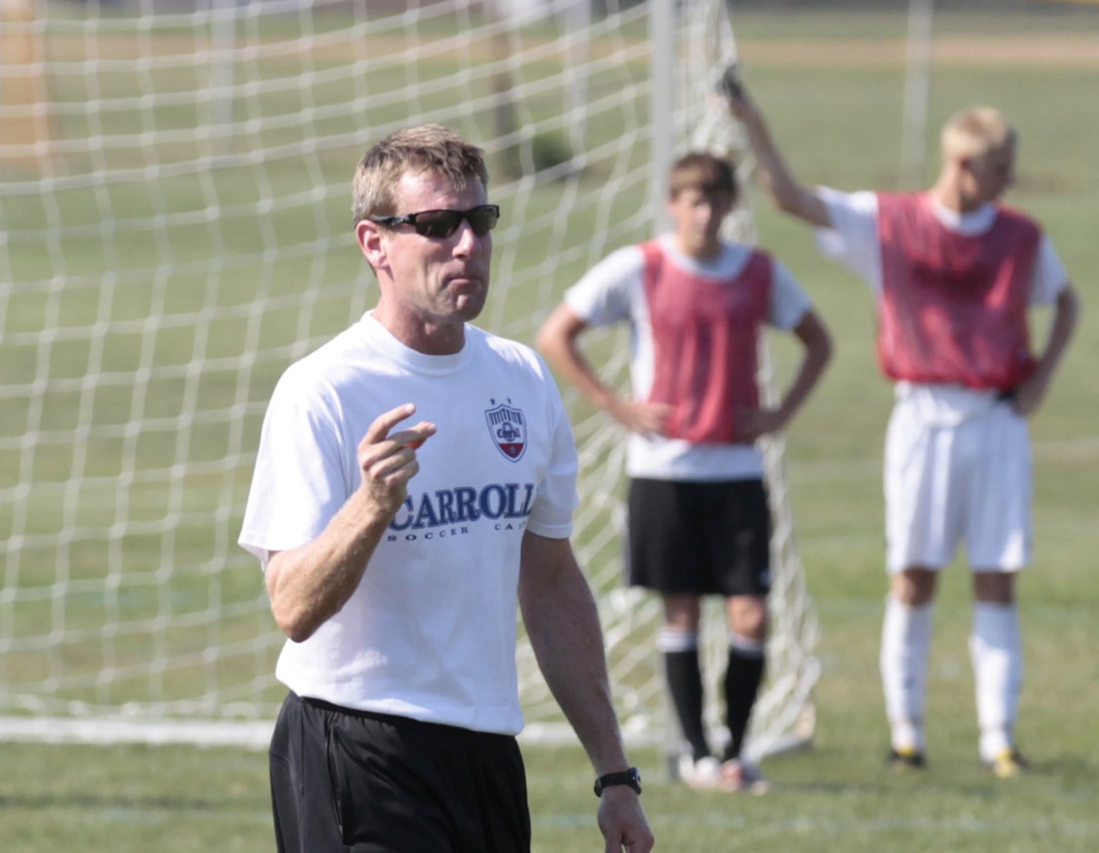 Scott Molfenter is Carroll’s athletic director and head boys soccer coach. He’s shown during practice on Aug. 19, 2010. COX MEDIA FILE PHOTO