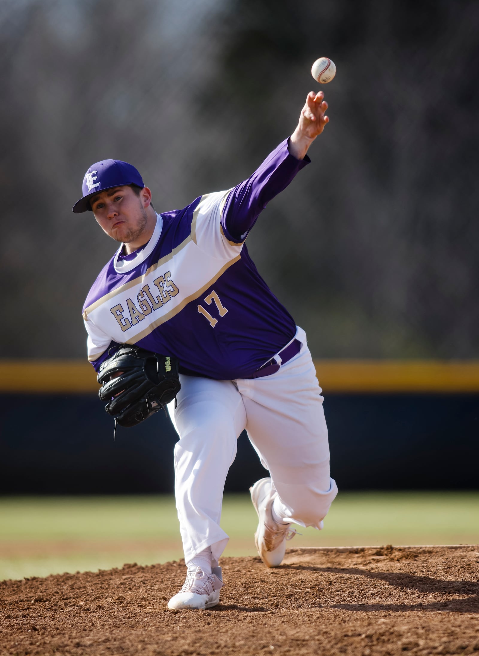 Eaton's Carson Brower pitches during their baseball game against Madison Wednesday, March 29, 2023 at Madison High School. Eaton won 13-1. Brower, who was born with a limb difference, pitches left handed then shifts his glove to his left hand to catch. Brower plans to play baseball at Bellarmine University after high school. NICK GRAHAM/STAFF