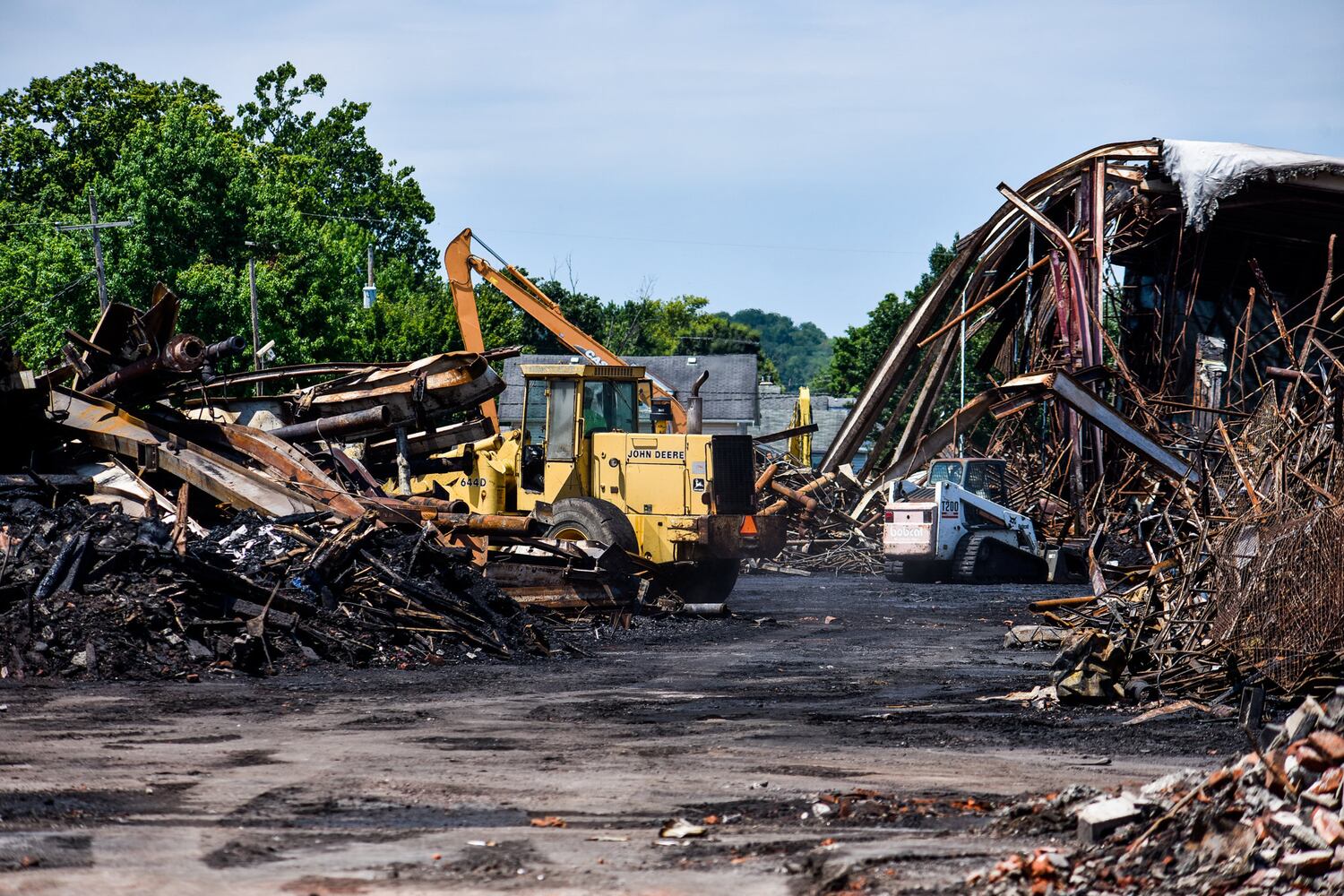 Crews demolish warehouse after massive fire in Hamilton