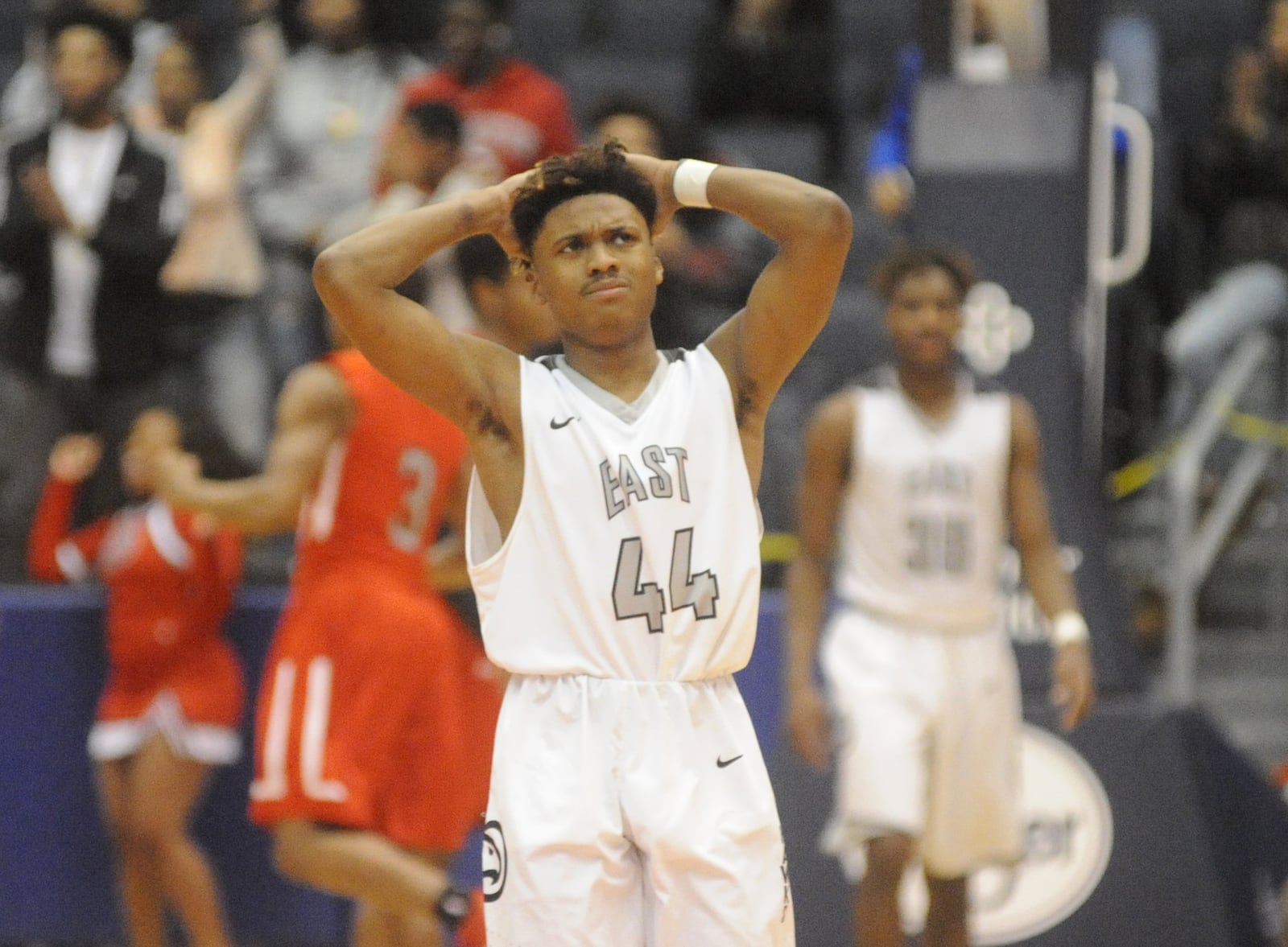 Lakota East’s Jalen Peck reacts to a last-second foul call on the Thunderhawks during a Division I district final against Princeton on Saturday afternoon at the University of Dayton Arena. MARC PENDLETON/STAFF