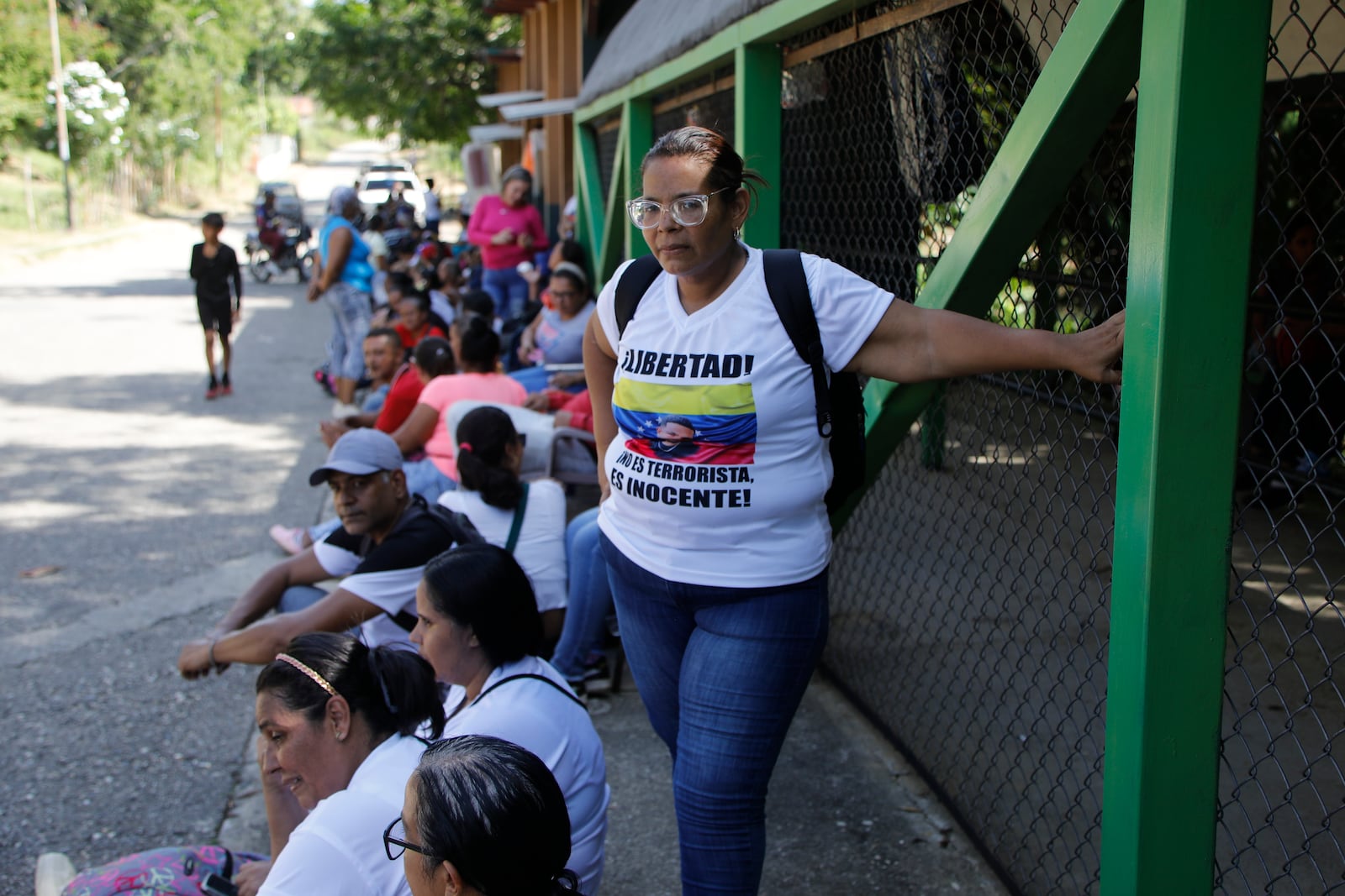 Alexandra Hurtado, center, waits for the release of her son Oscar Escalona, outside the Yare 3 prison in San Francisco de Yare, Venezuela, Saturday, Nov 16, 2024. Attorney General Tarek William Saab announced the release of some of those who were detained during a government crackdown following anti-government protests against the results of the presidential election. (AP Photo/Cristian Hernandez)