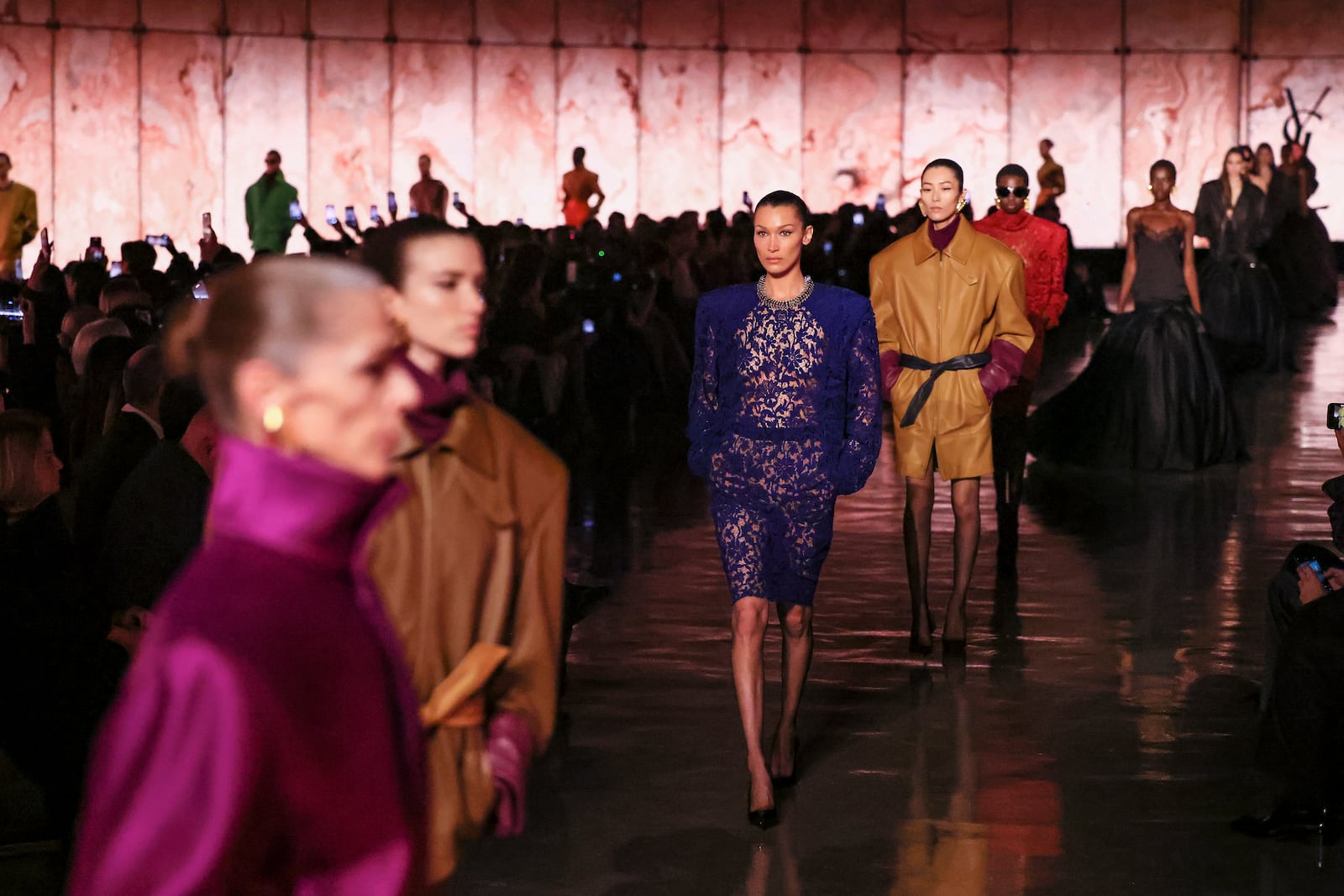 Bella Hadid wears a creation as part of the Saint Laurent Fall/Winter 2025-2026 Womenswear collection presented Tuesday, March 11, 2025. in Paris. (AP Photo/Thomas Padilla)