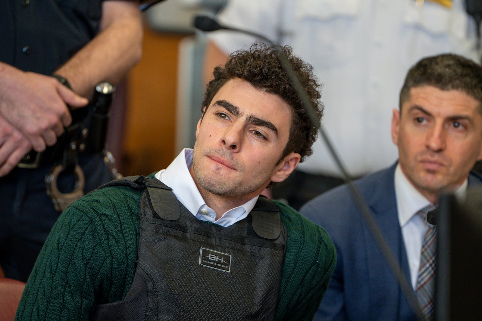 Luigi Mangione, accused of fatally shooting the UnitedHealthcare CEO Brian Thompson in New York City and leading authorities on a five-day search is scheduled, appears in court for a hearing, Friday, Feb. 21, 2025, in New York. (Steven Hirsch/New York Post via AP, Pool)