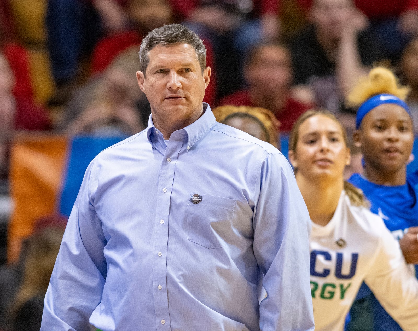 FILE - Florida Gulf Coast head coach Karl Smesko, left, watches play on the court during a first-round college basketball game against Oklahoma in the NCAA Tournament, March 23, 2024, in Bloomington, Ind. (AP Photo/Doug McSchooler, File)