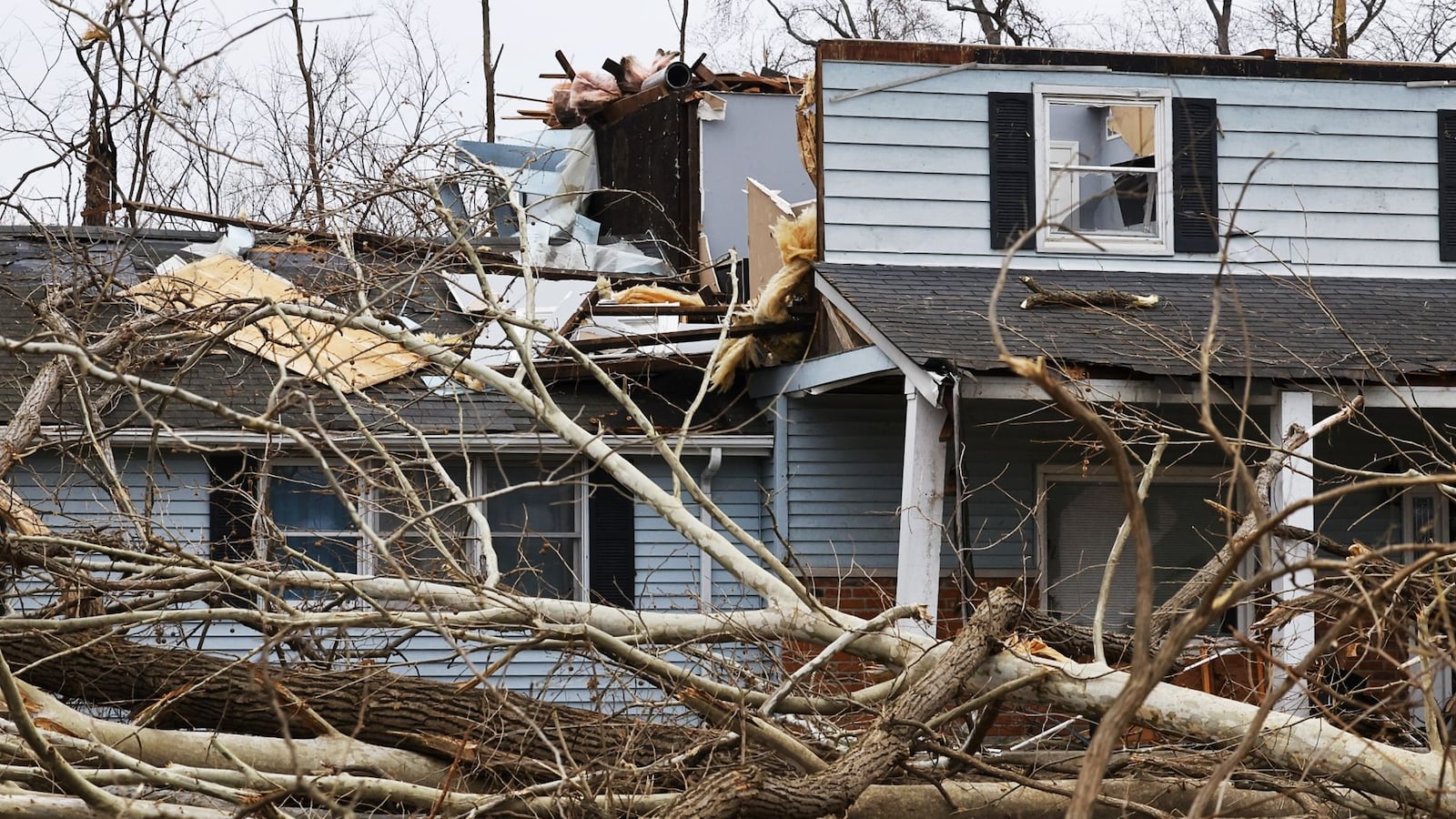 Several homes were damaged by a possible tornado in Madison Township in Butler County Monday, Feb. 28, 2023. This house is on Elk Creek Road. NICK GRAHAM/STAFF