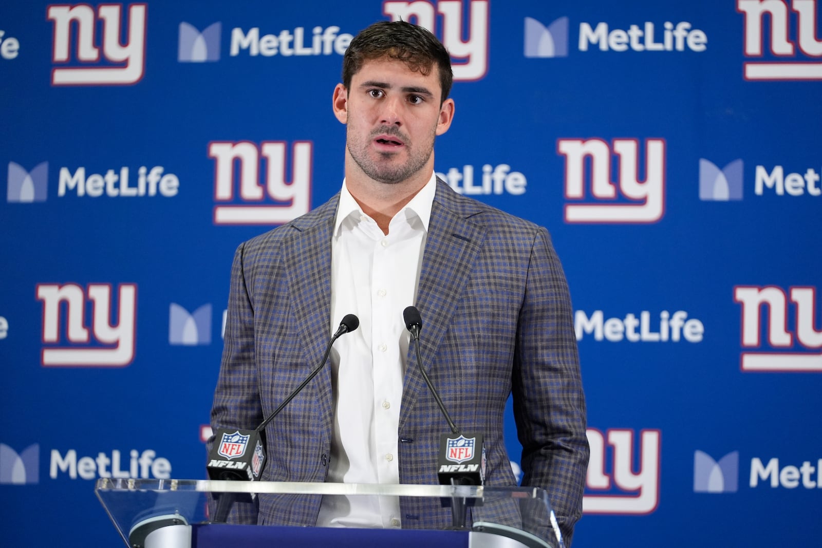 New York Giants quarterback Daniel Jones speaks during a news conference after an NFL football game against the Cincinnati Bengals, Sunday, Oct. 13, 2024, in East Rutherford, N.J. The Bengals won 17-7. (AP Photo/Frank Franklin II)