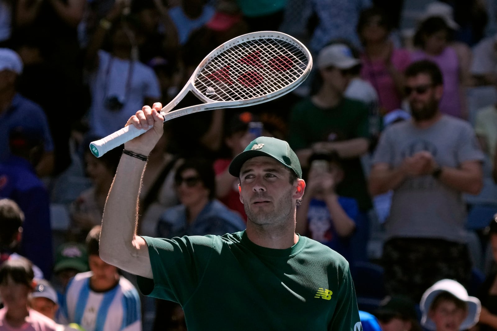 Tommy Paul of the U.S. celebrates after defeating Roberto Carballes Baena of Spain in their third round match at the Australian Open tennis championship in Melbourne, Australia, Friday, Jan. 17, 2025. (AP Photo/Manish Swarup)