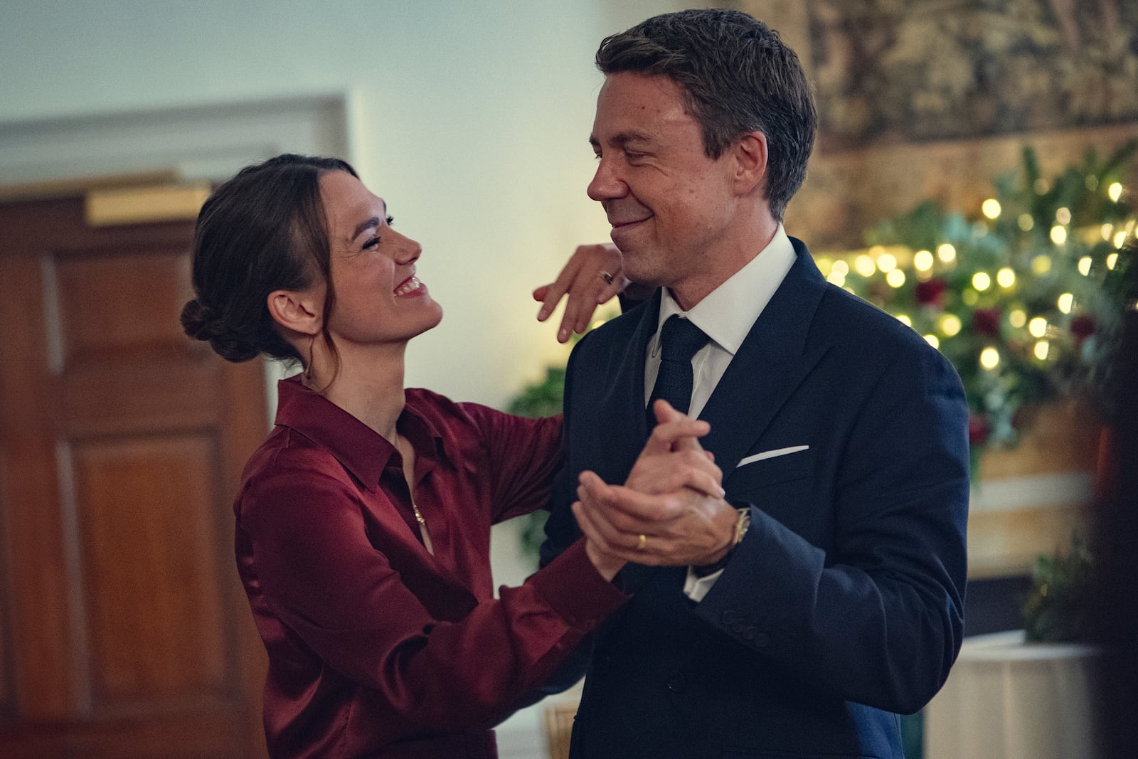 This image released by Netflix shows Keira Knightley, left, and Andrew Buchan in a scene from "Black Doves." (Stefania Rosini/Netflix via AP)