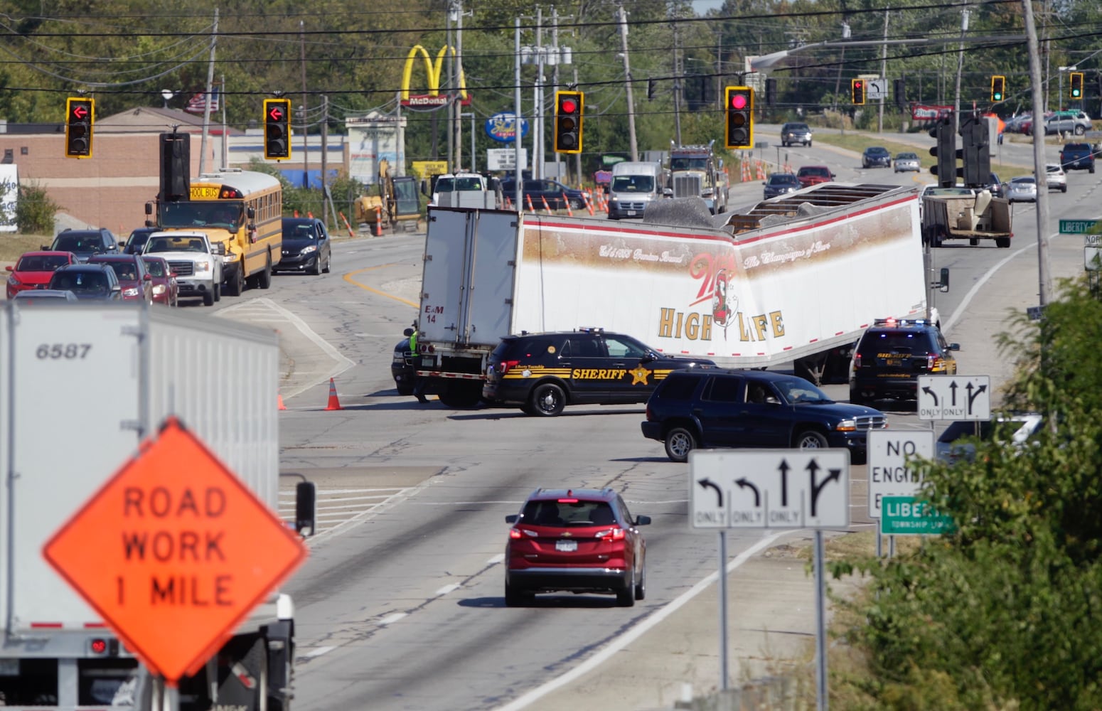 PHOTOS: Semi hauling beer collapses in Butler County, blocking traffic