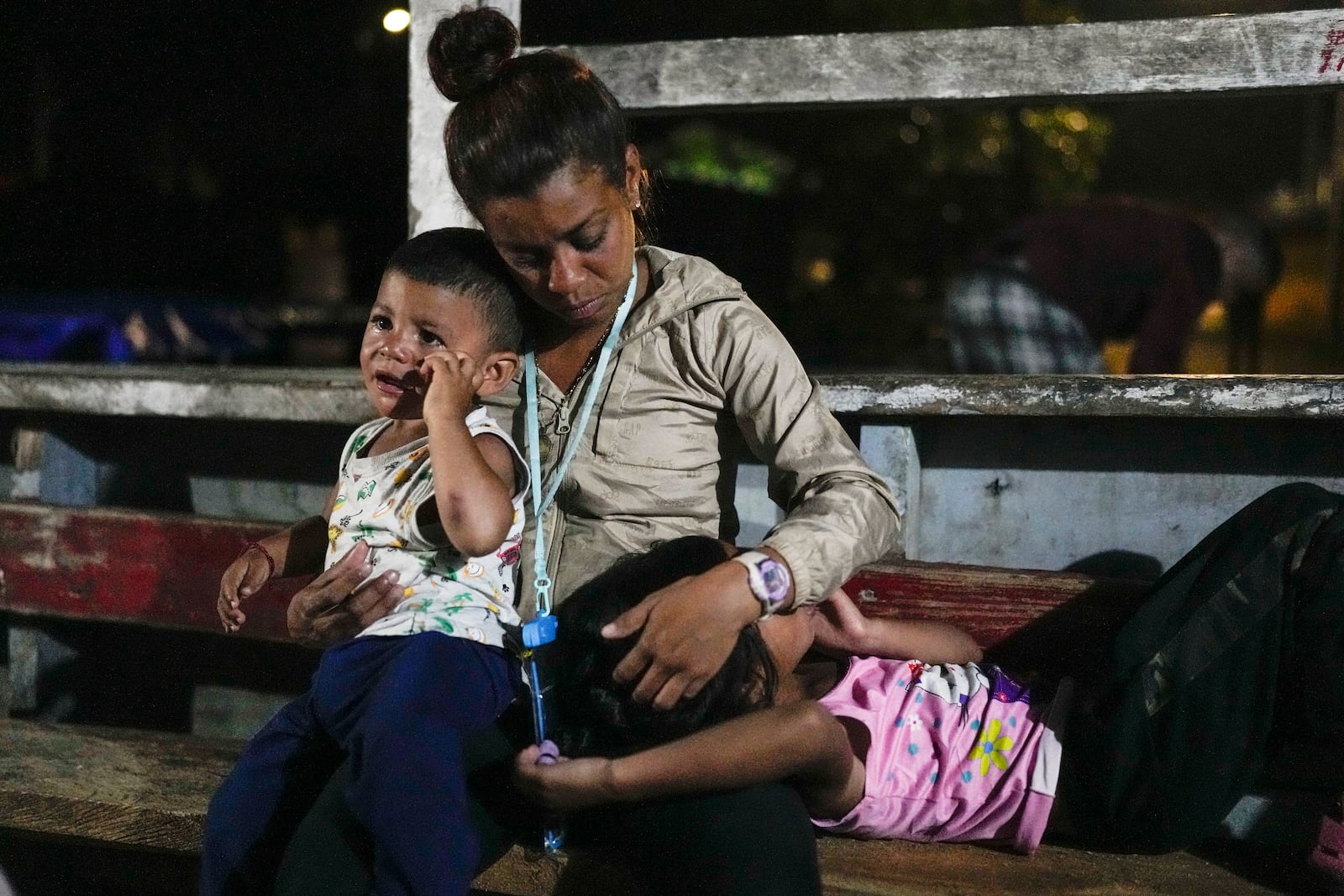 Venezuelan migrant Naomi Diaz sits on a boat departing from Panama's Caribbean coastal village of Miramar to the border with Colombia, Thursday, Feb. 27, 2025. Migrants are returning from southern Mexico after giving up on reaching the U.S., a reverse flow triggered by President Trump administration's immigration crackdown. (AP Photo/Matias Delacroix)