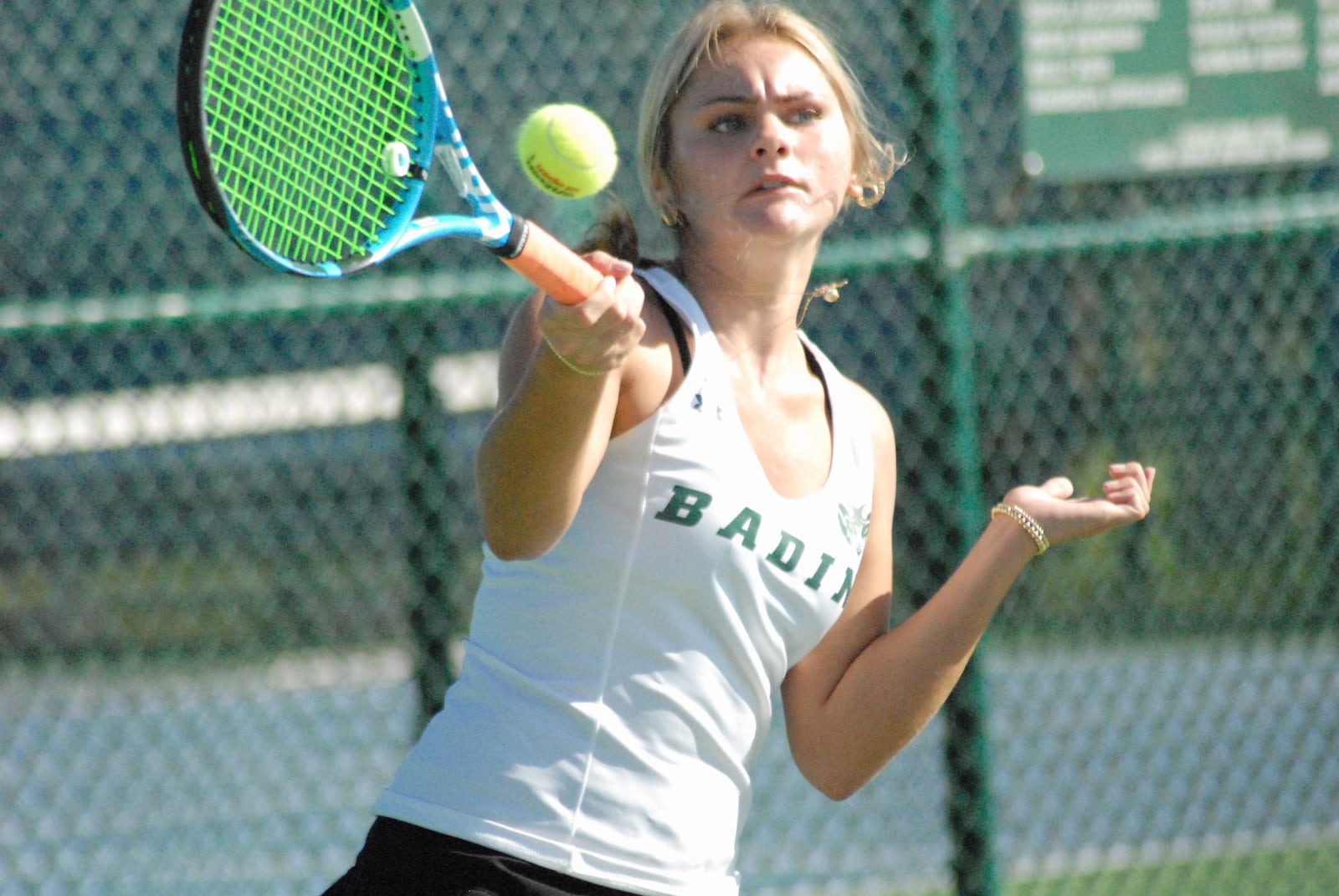 Badin's Emmy Demmel sends a return volley back across the net during the Division II sectional tournament at Mason on Tuesday. Chris Vogt/CONTRIBUTED