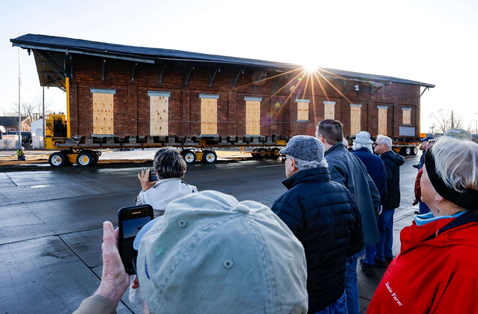 The second of two buildings that was once a train depot owned by CSX was moved by Wolfe House And Building Movers to its new location at the corner of Maple Avenue and MLK Jr. Boulevard Tuesday, Jan. 17, 2023 in Hamilton. The first building, a 220-ton two-story building, was moved in December. NICK GRAHAM/STAFF