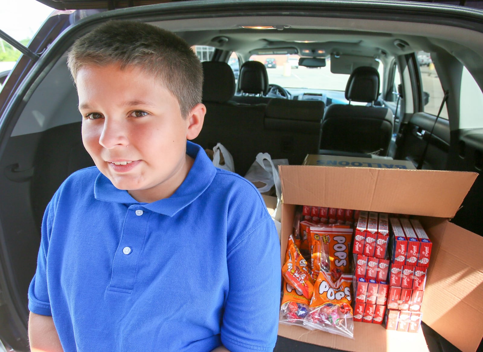 In this 2017 file photo, Logan Pickett, then 12, was recognized for raising money and working to provide for those who are less fortunate. GREG LYNCH/STAFF