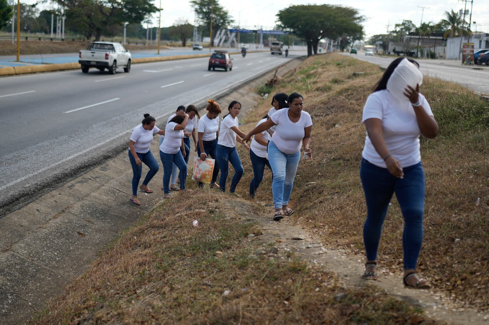 Relatives of prisoners detained in a post-election crackdown leave Tocuyito Prison after a visit, in Tocuyito, Venezuela, Monday, Jan. 20, 2025. (AP Photo/Ariana Cubillos)