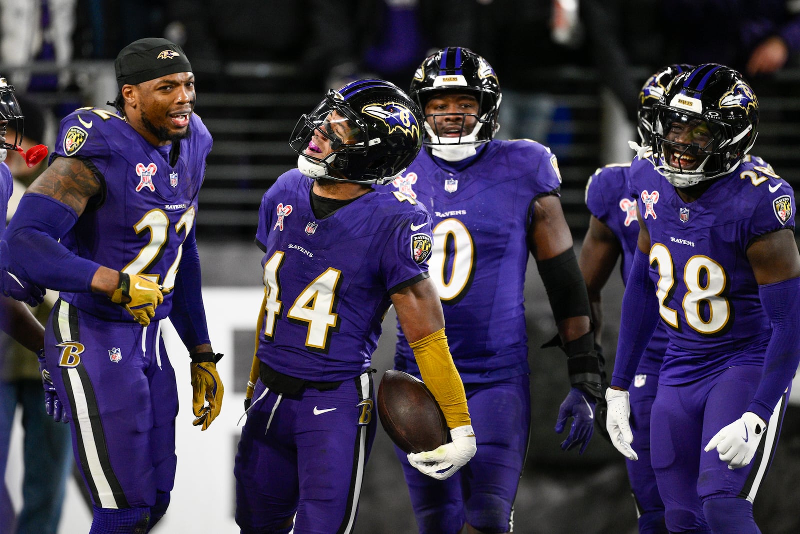 Baltimore Ravens cornerback Marlon Humphrey (44) celebrates his pick-6 interception score with teammates during the second half of an NFL football game against the Pittsburgh Steelers, Saturday, Dec. 21, 2024, in Baltimore. (AP Photo/Nick Wass)