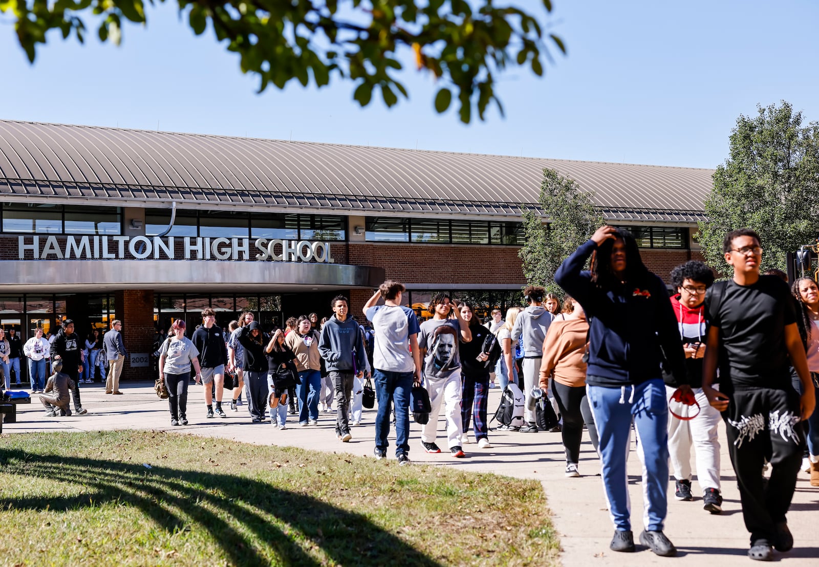 Students exit Hamilton High School at the end of the school day Thursday, Oct. 3, 2024 in Hamilton. NICK GRAHAM/STAFF