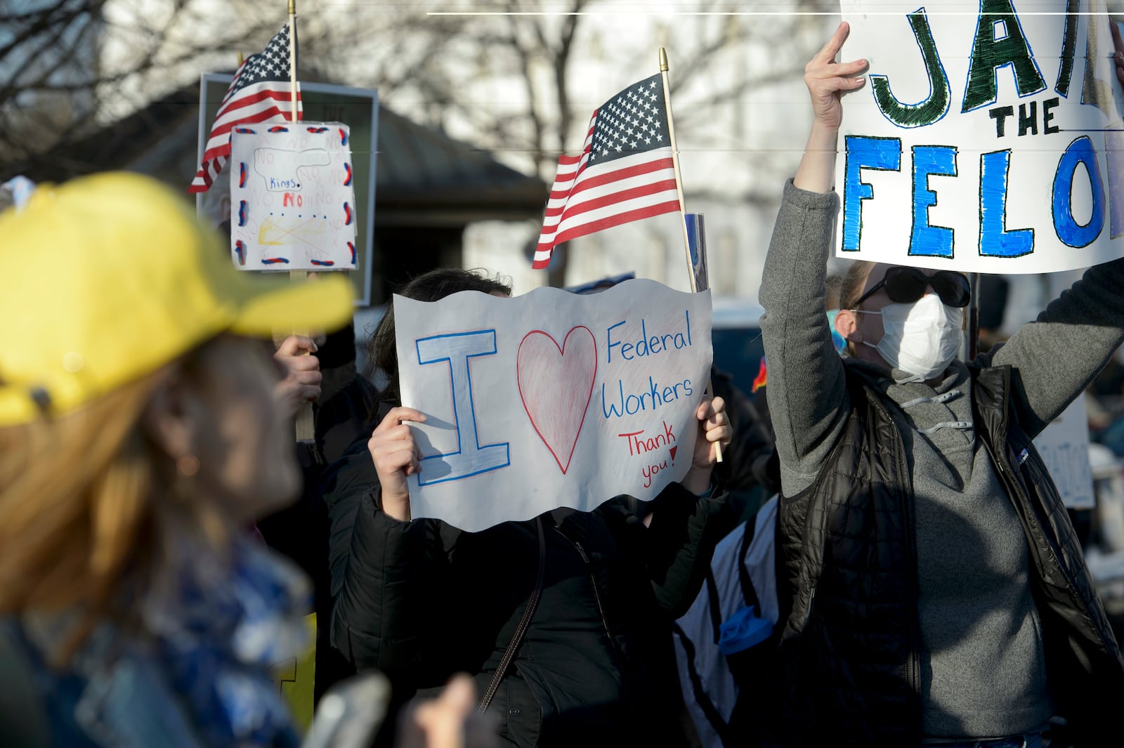 Demonstrators protest across the street from the Capitol in the hours prior to President Donald Trump's address to a joint session of Congress at the Capitol, Tuesday, March 4, 2025, in Washington. (AP Photo/Rod Lamkey, Jr.)