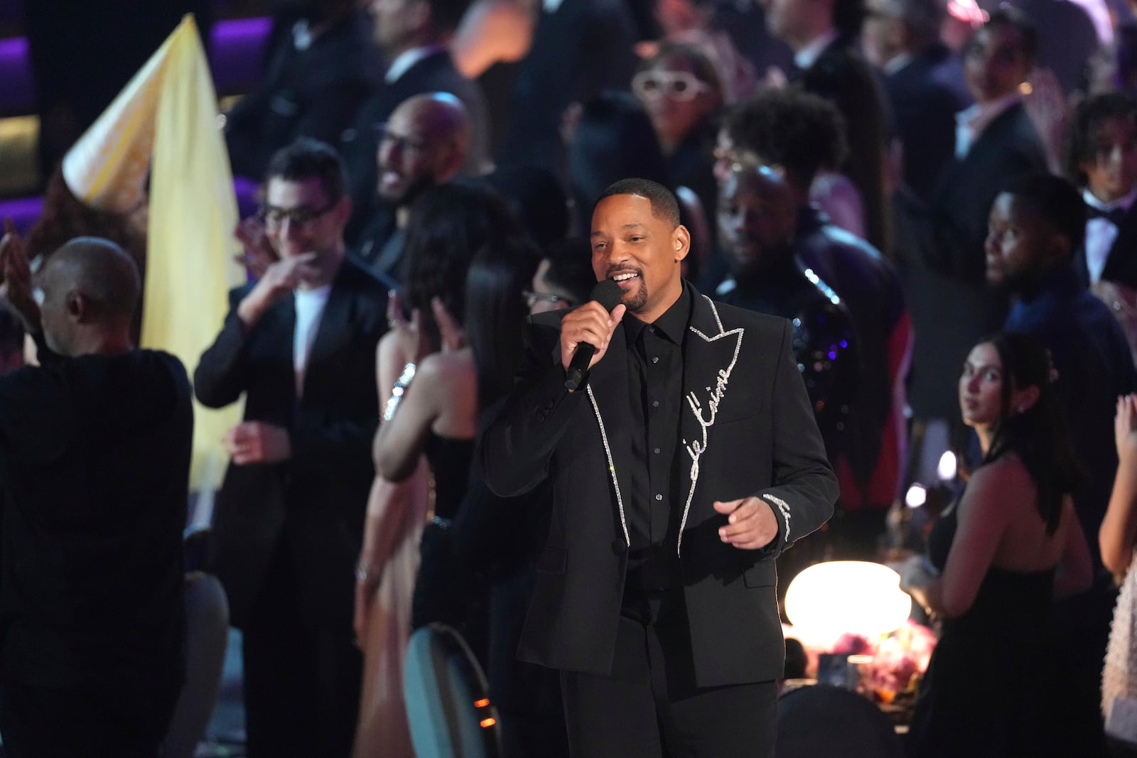 Will Smith speak about Quincy Jones during the 67th annual Grammy Awards on Sunday, Feb. 2, 2025, in Los Angeles. (AP Photo/Chris Pizzello)