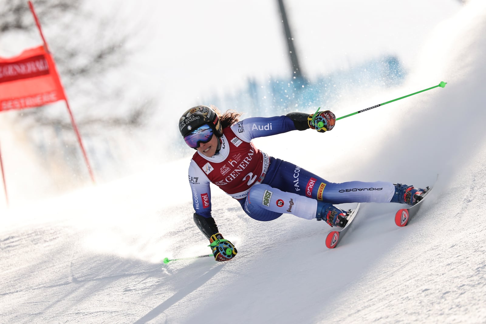 Italy's Federica Brignone speeds down the course during an alpine ski, women's World Cup giant slalom in Sestriere, Italy, Friday, Feb. 21, 2025. (AP Photo/Marco Trovati)