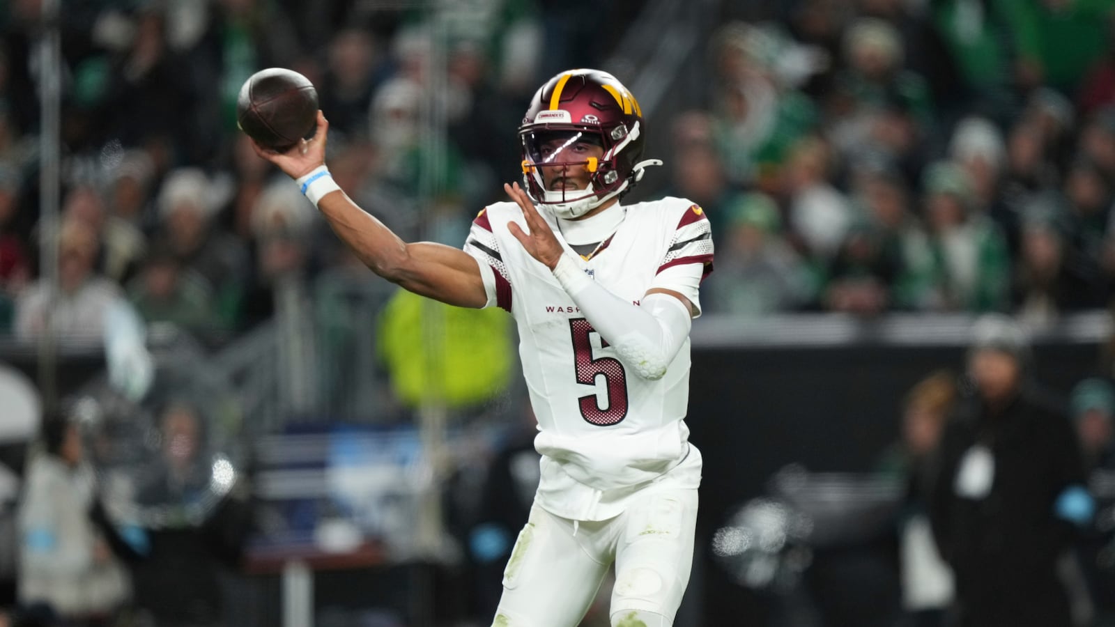 Washington Commanders quarterback Jayden Daniels throws during the first half of an NFL football game against the Philadelphia Eagles Thursday, Nov. 14, 2024, in Philadelphia. (AP Photo/Matt Slocum)