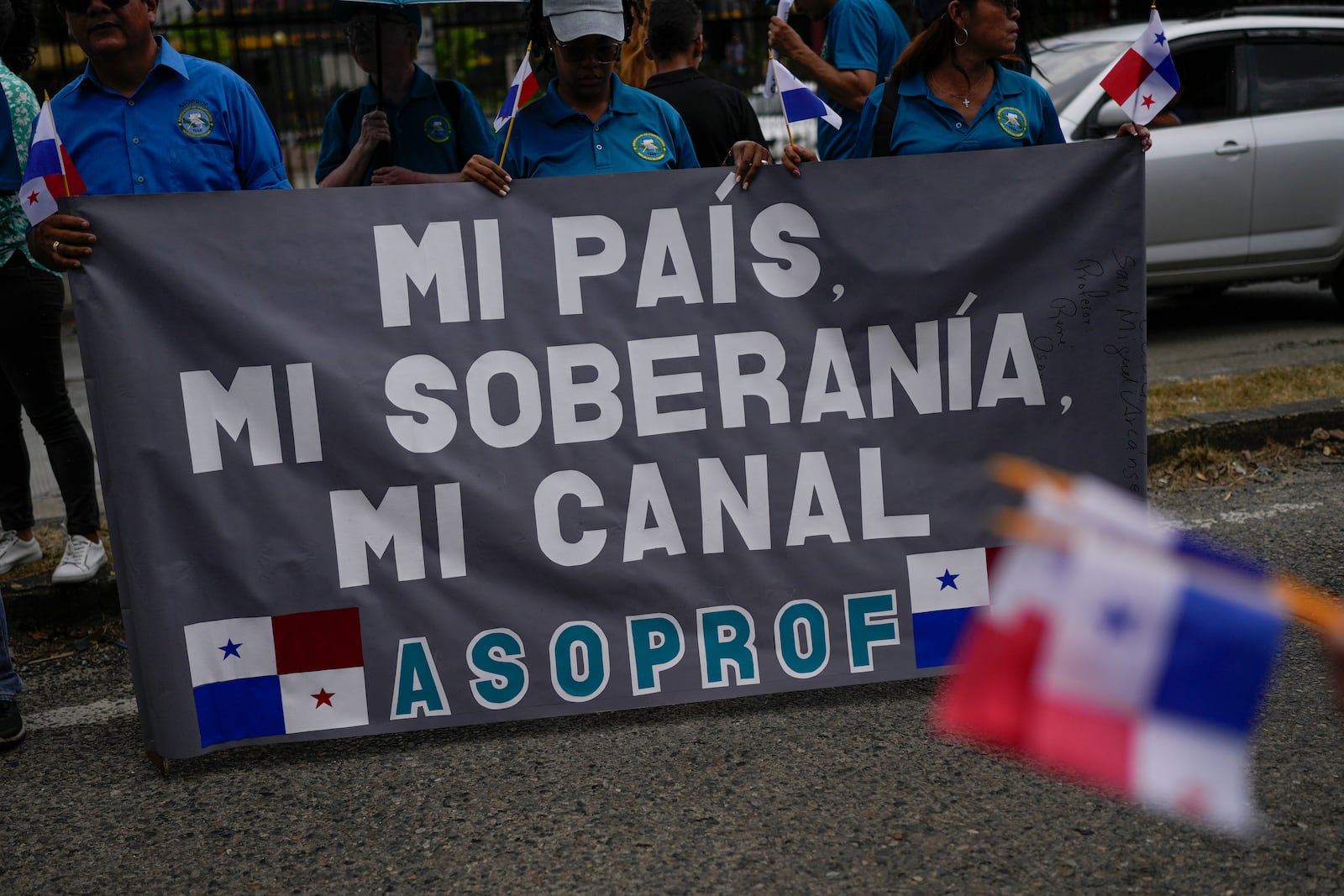 Demonstrators carry a sign that reads in Spanish: "My country, my sovereignty, my canal," referring to the Panama Canal, as they protest the upcoming visit of U.S. Secretary of State Marco Rubio in Panama City, Friday, Jan. 31, 2025. (AP Photo/Matias Delacroix)